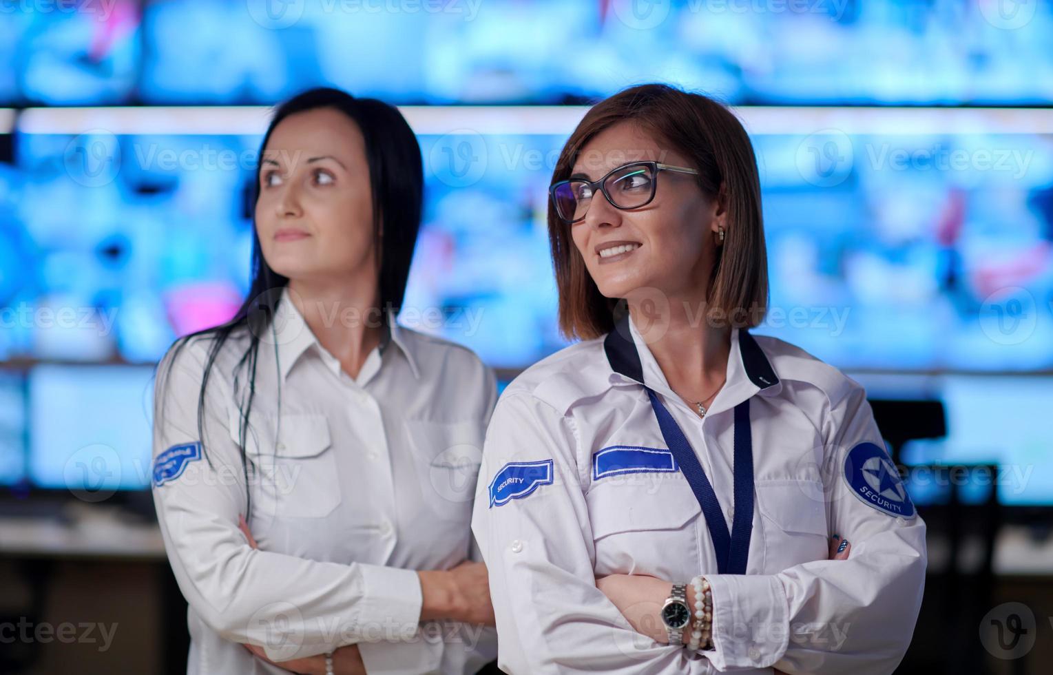 group portrait of Female operator in a security data system control room photo