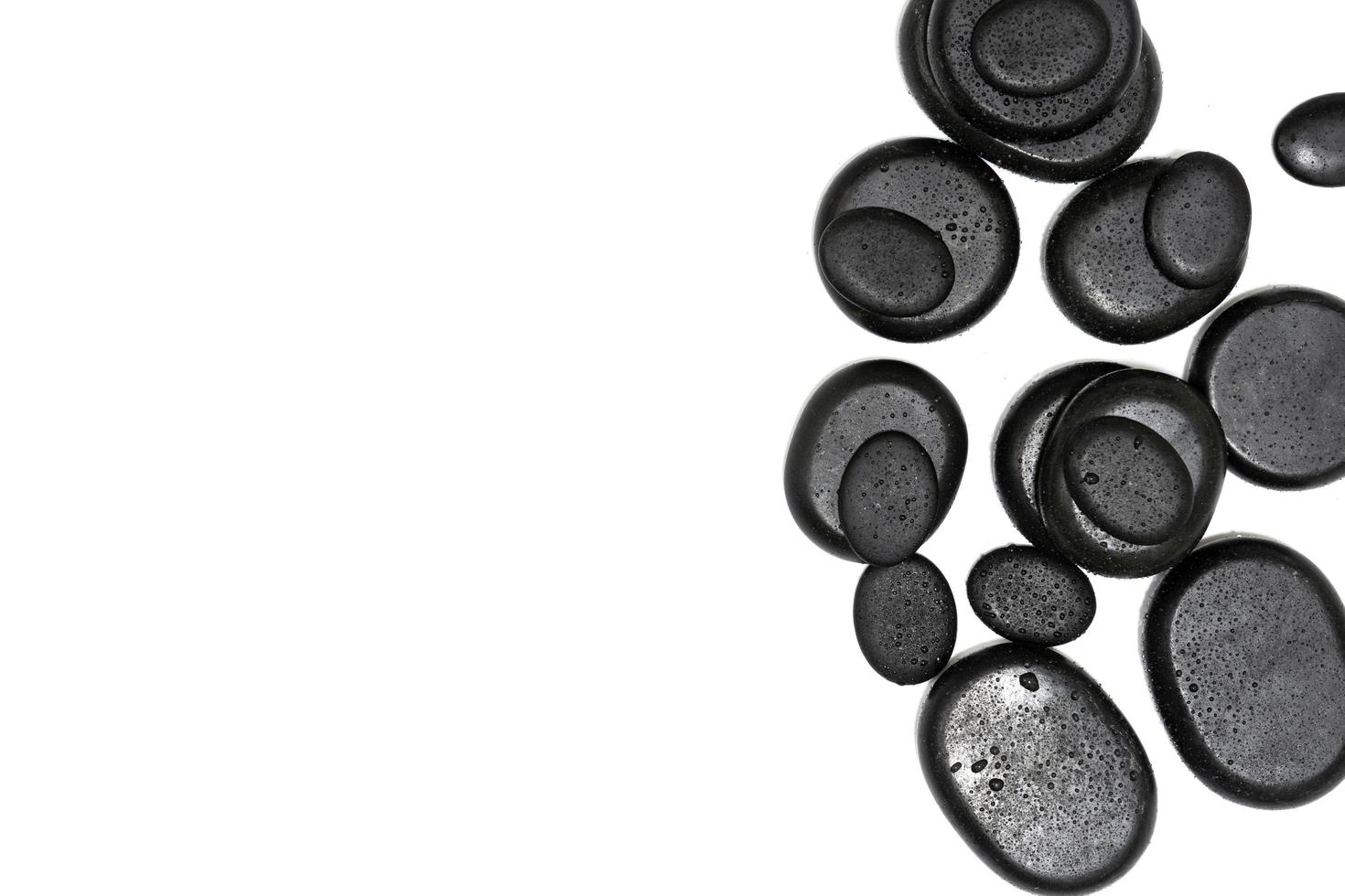 Top view zen basalt stones on the white photo
