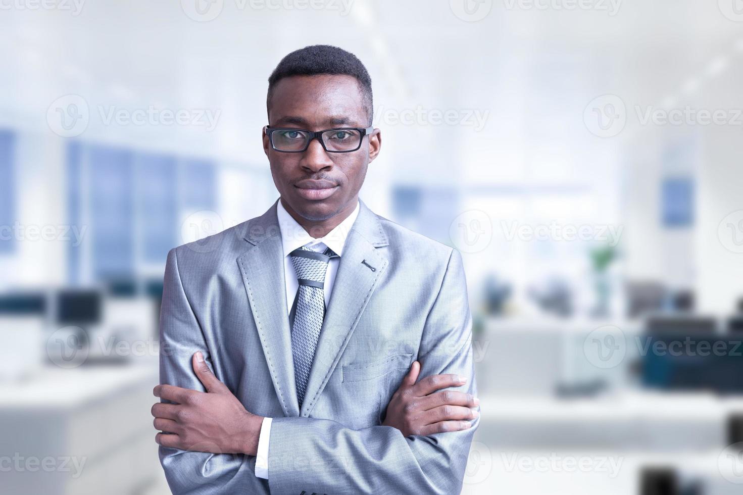 Young businessman in his office photo