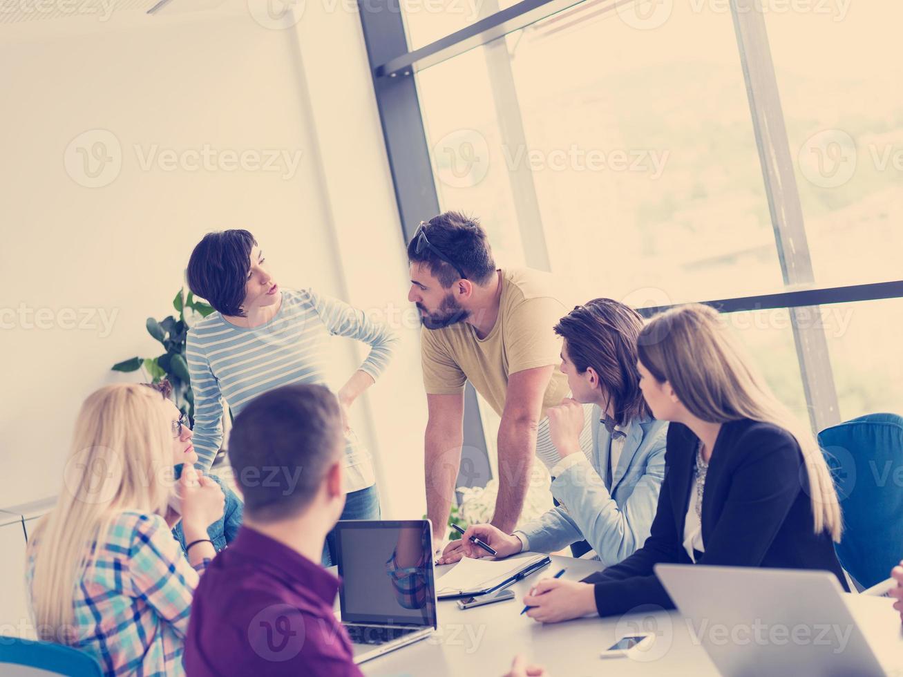 Business Team At A Meeting at modern office building photo