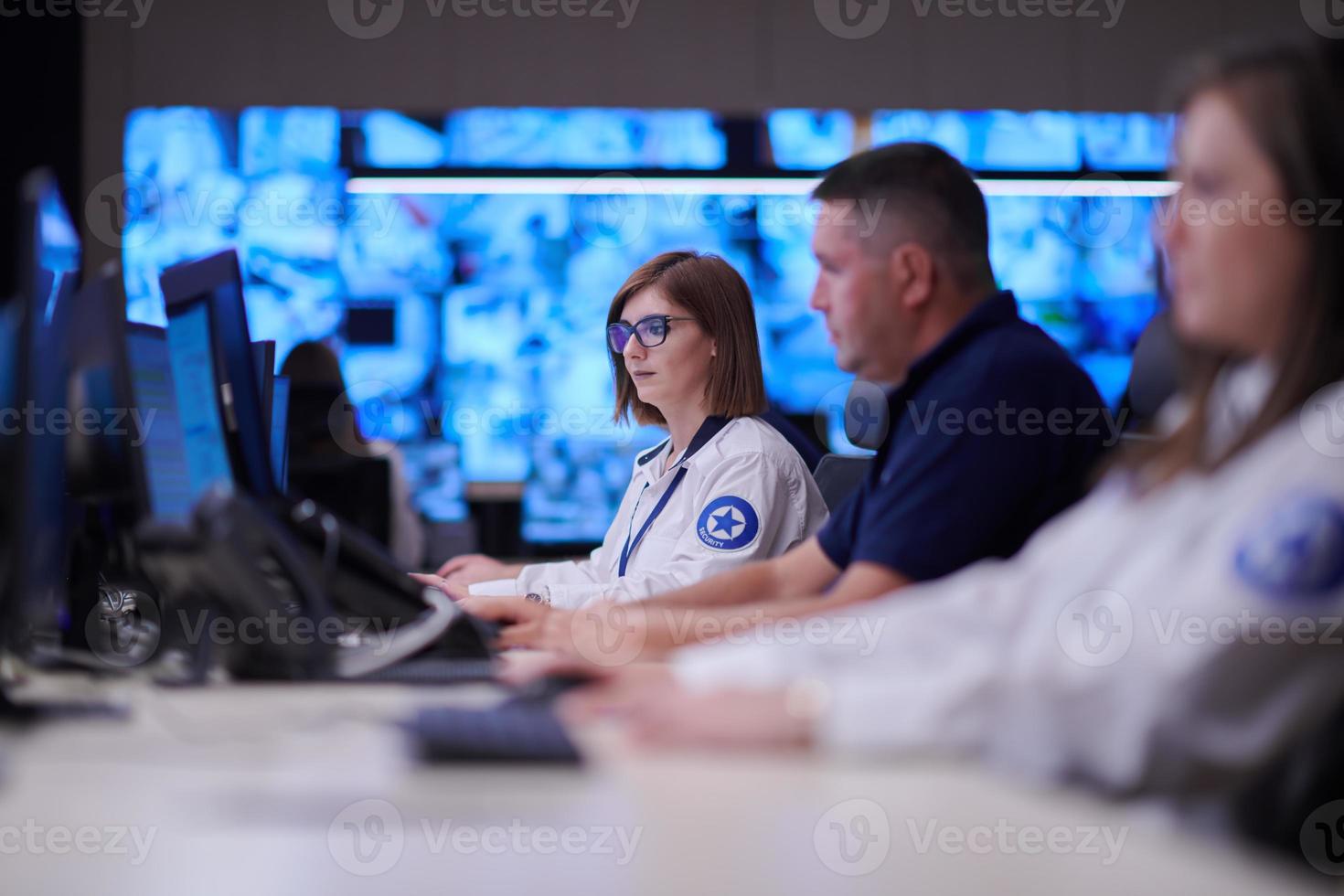 Group of Security data center operators at work photo