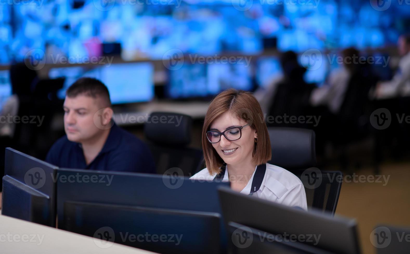 Group of Security data center operators at work photo