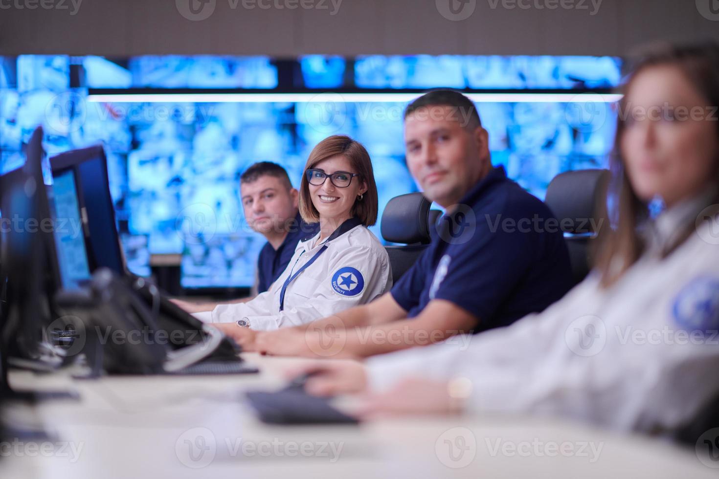 Group of Security data center operators at work photo