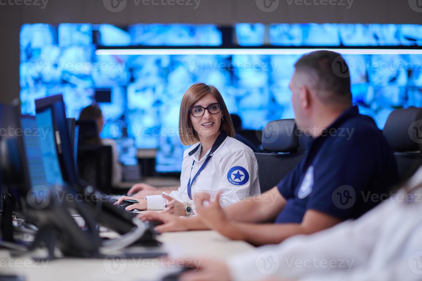 Group of Security data center operators at work photo