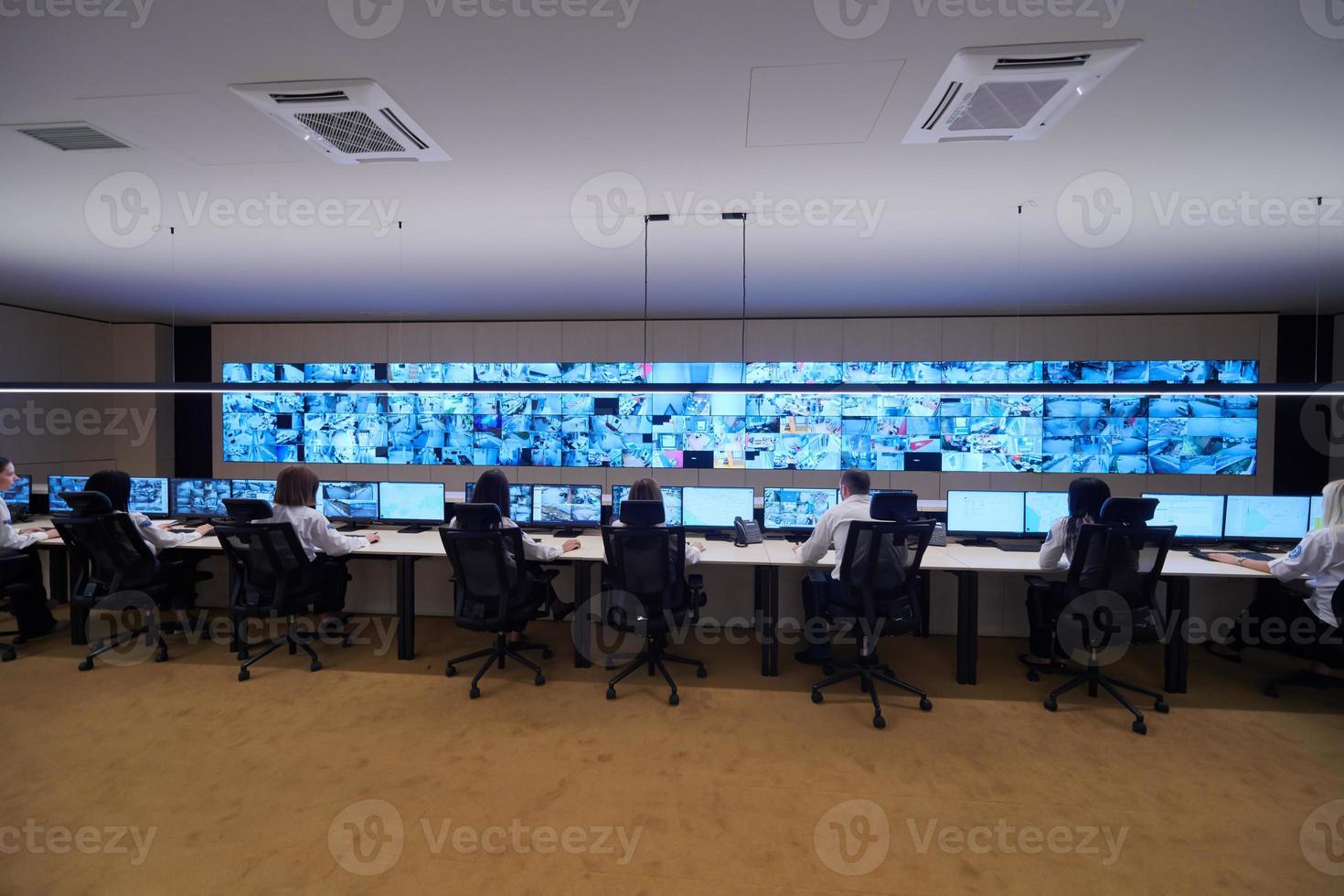 Group of Security data center operators at work photo
