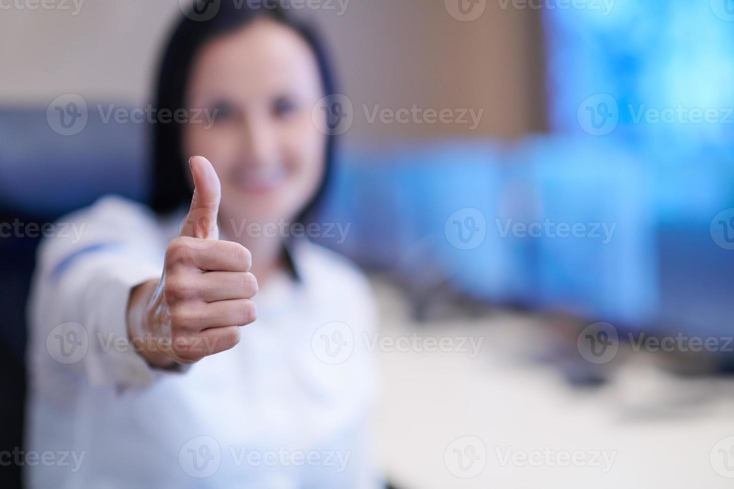 portrait of Female operator in a security data system control room photo
