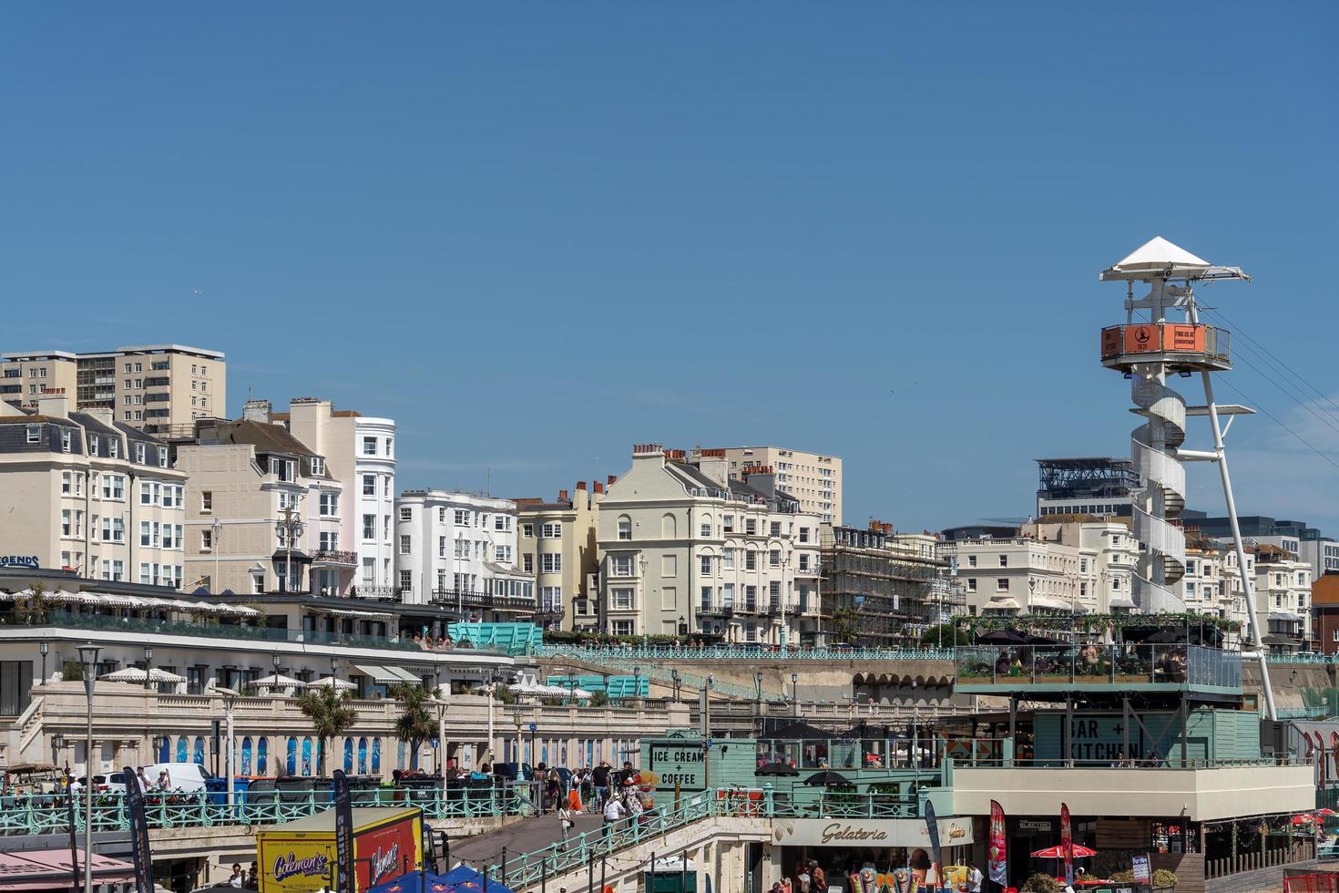 Brighton, East Sussex, UK - July 15, 2022. View of the beachfront and zip wire in Brighton on July 15, 2022. Unidentified people photo