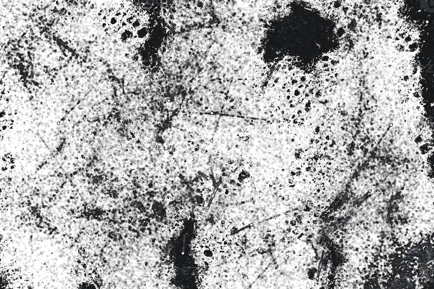 Grunge black and white pattern. Monochrome particles abstract texture. Background of cracks, scuffs, chips, stains, ink spots, lines. Dark design background surface. photo