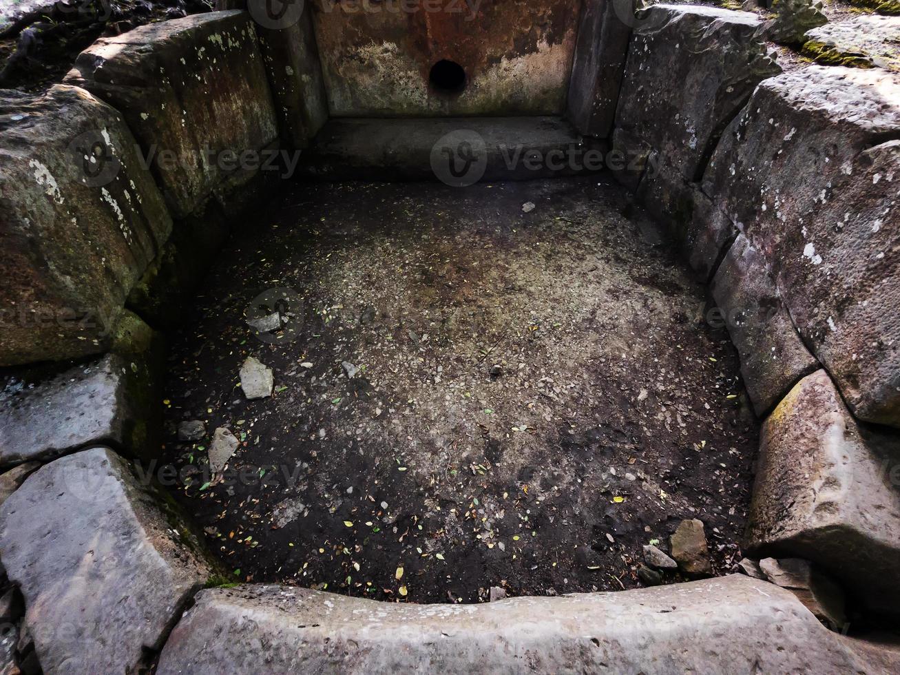 An ancient megalithic Dolmen structure in the form of stone slabs photo