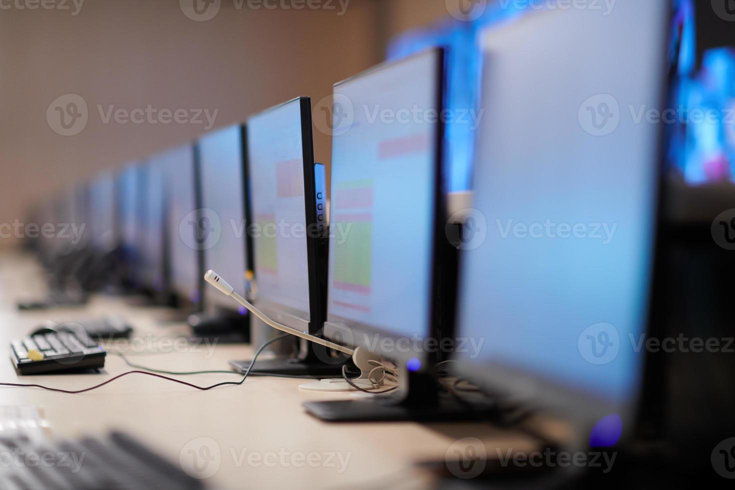 Empty interior of big modern security system control room photo