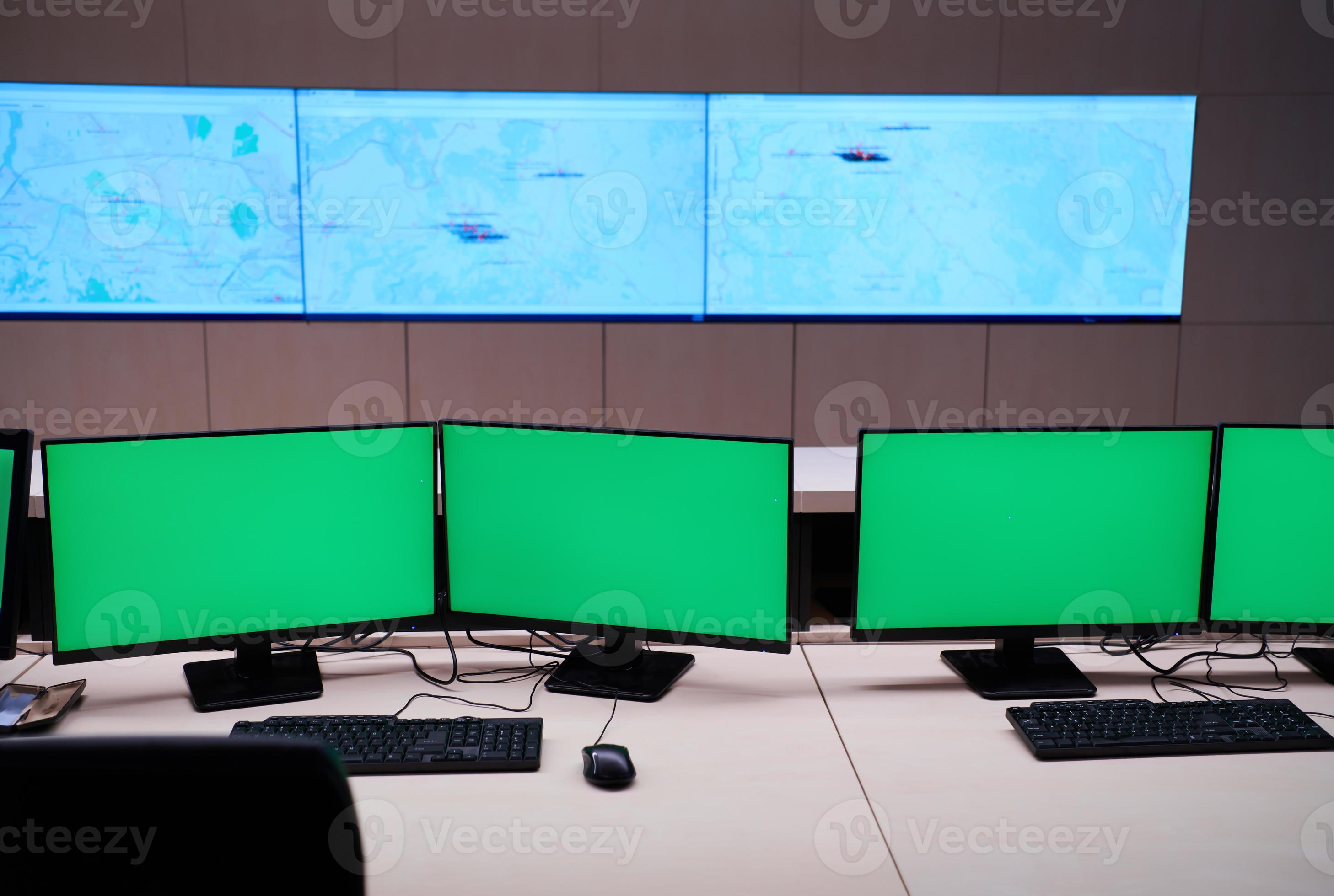 Empty interior of big modern security system control room with blank