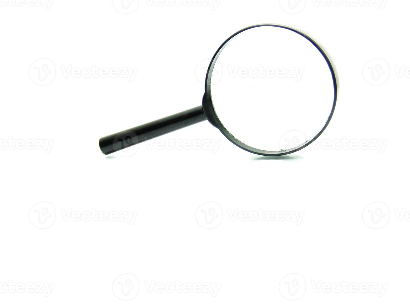 magnifying glass on white photo