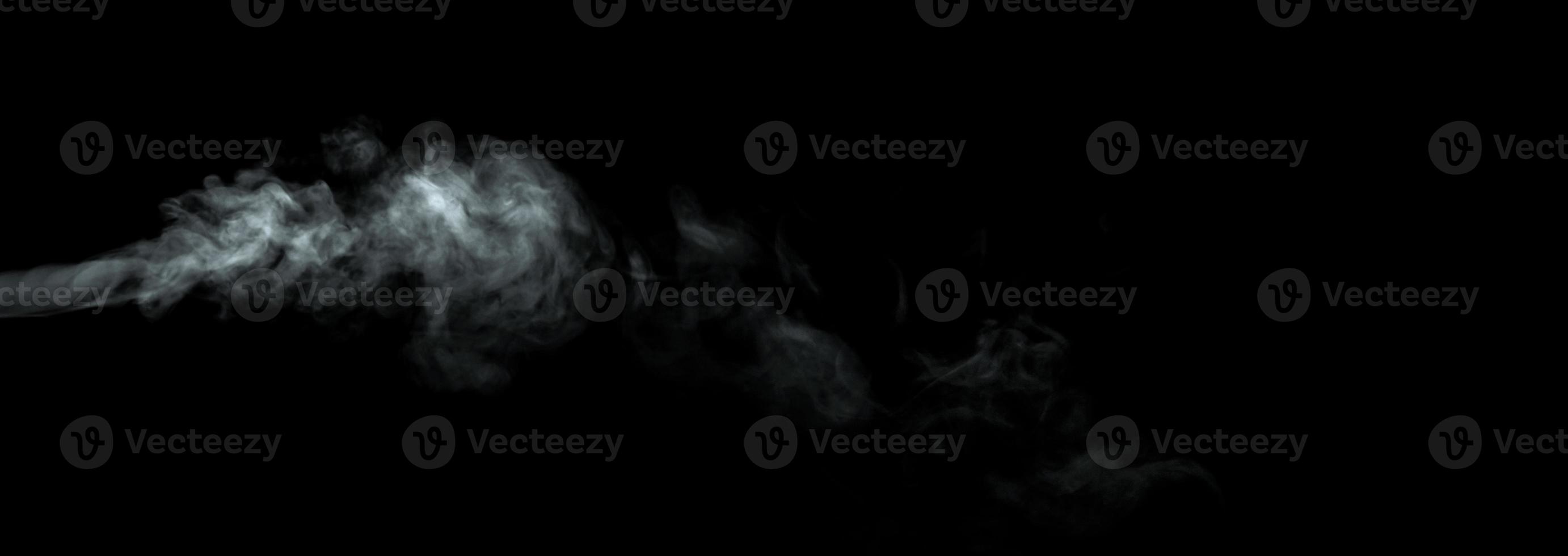 Abstract powder or smoke isolated on black background photo