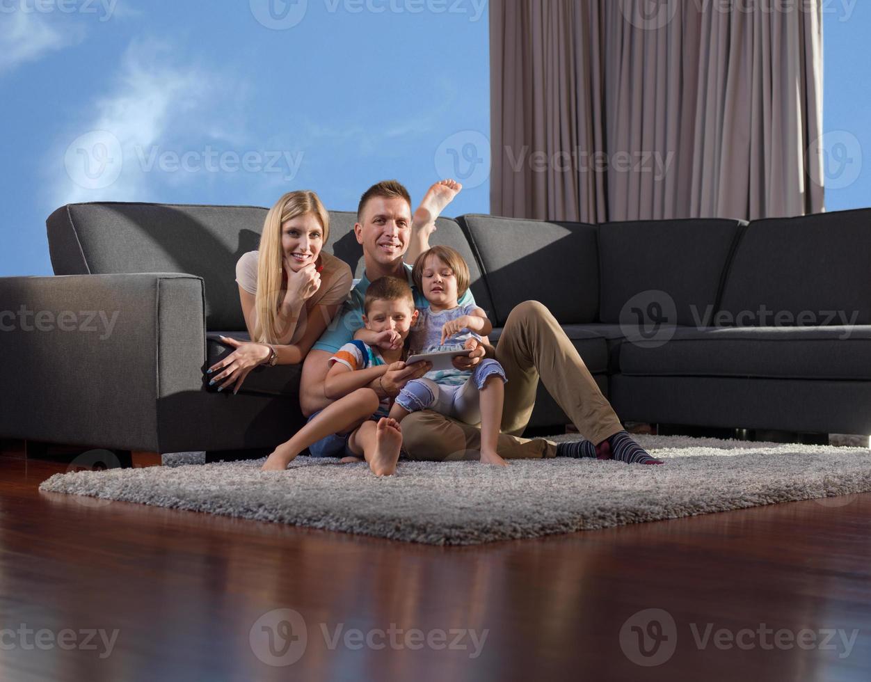 Family in livingroom photo