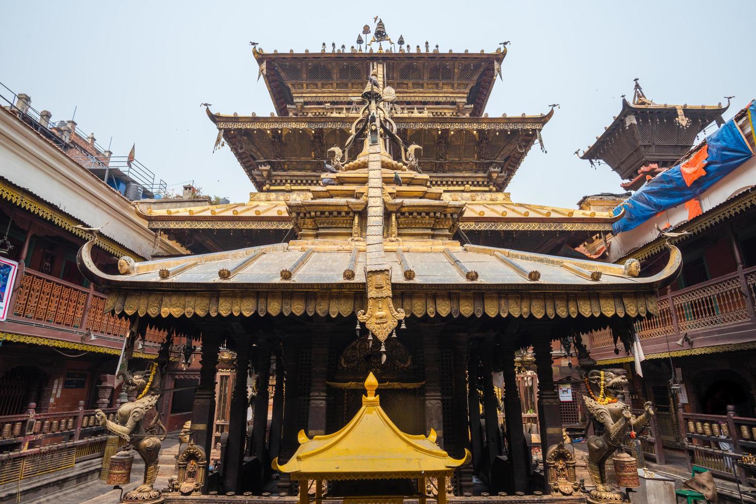 The golden temple in Patan unique Buddhist monastery in north of Durbar Square, Kathmandu of Nepal. photo
