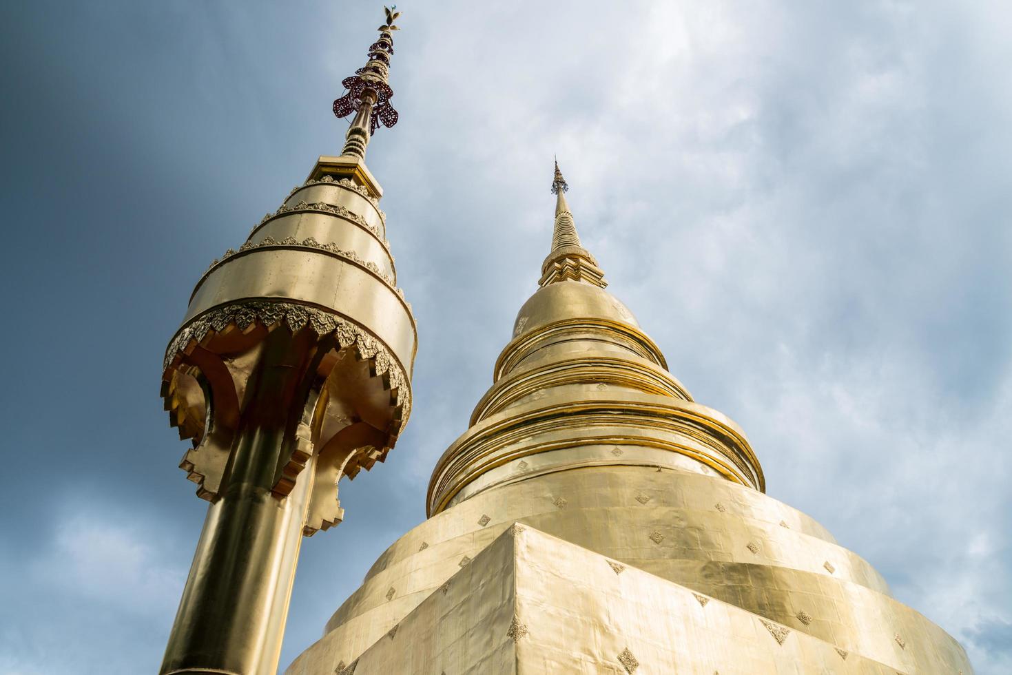 The golden pagoda of Wat Phra Singh is a Buddhist temple in Chiang Mai, Northern Thailand. photo