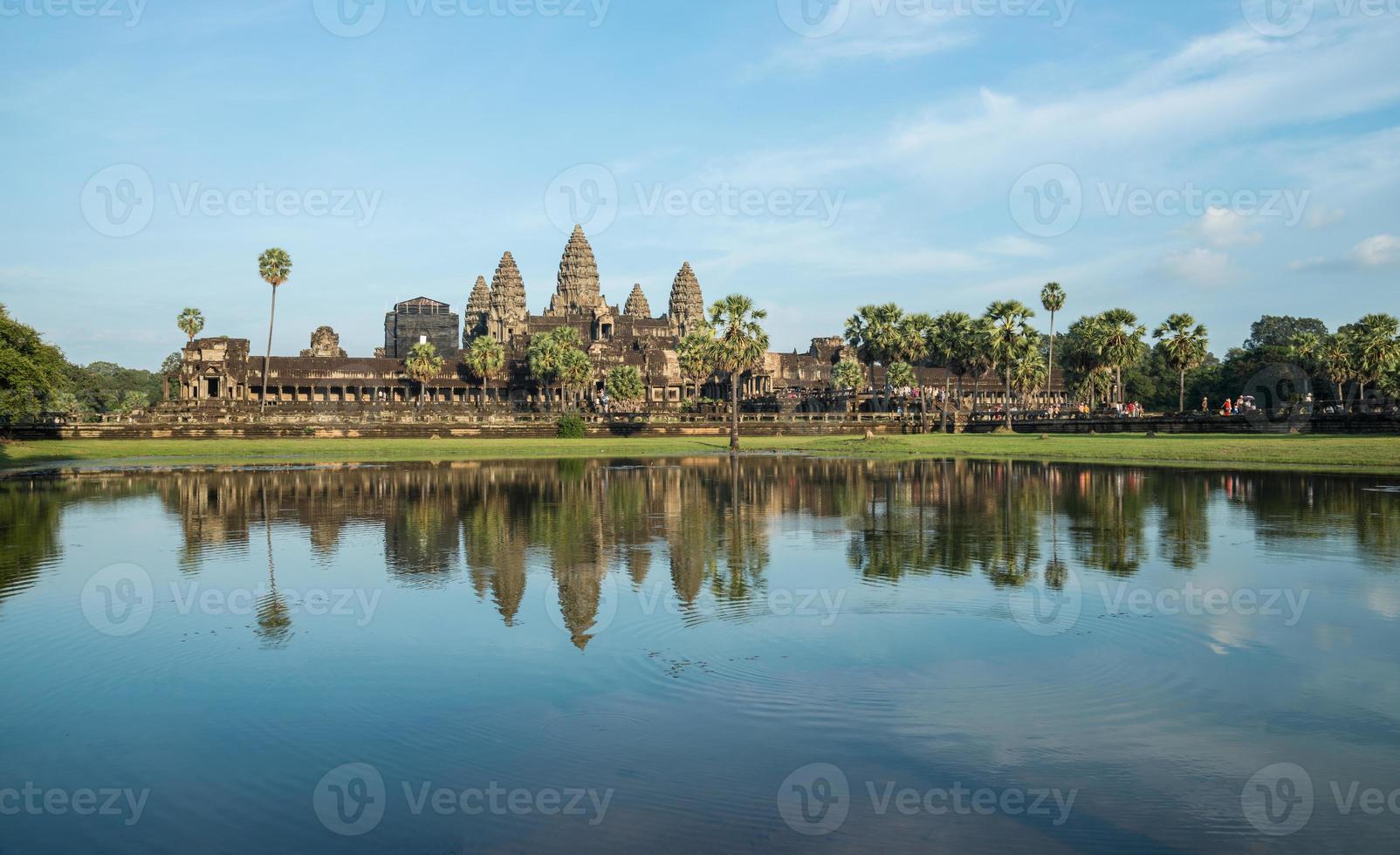 The reflection of Angkor wat is a temple complex in Cambodia and the largest religious monument in the world, with the site measuring 162.6 hectares. photo