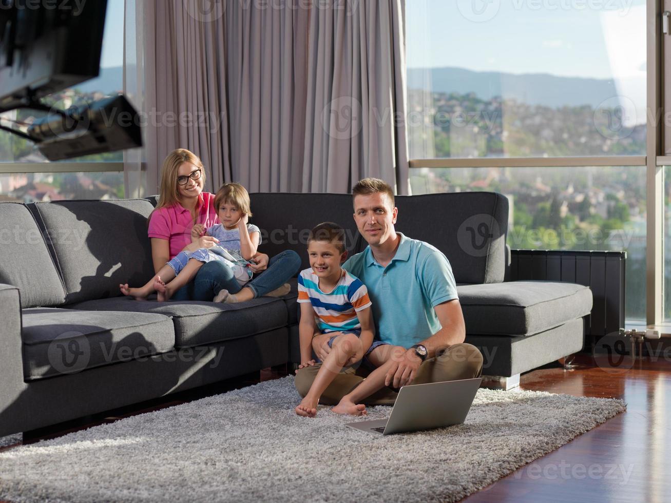Family in livingroom photo