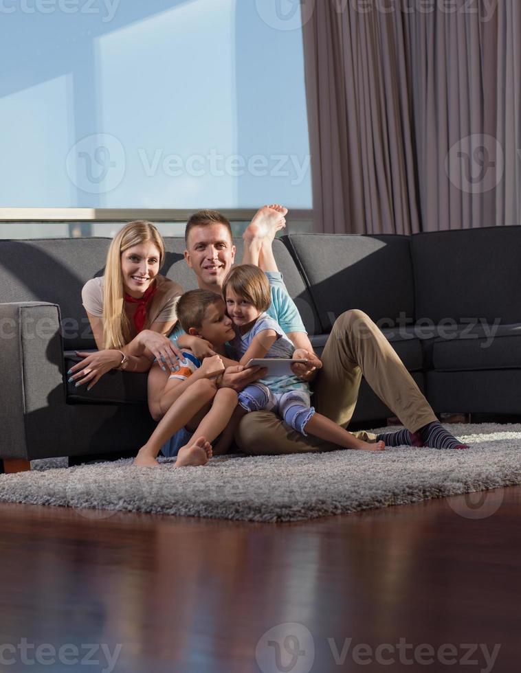 Family in livingroom photo