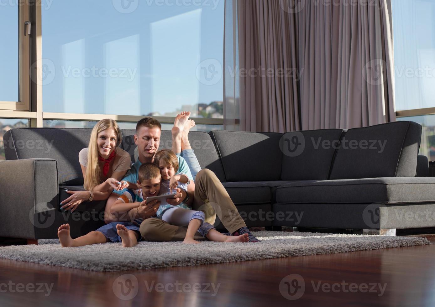 Family in livingroom photo