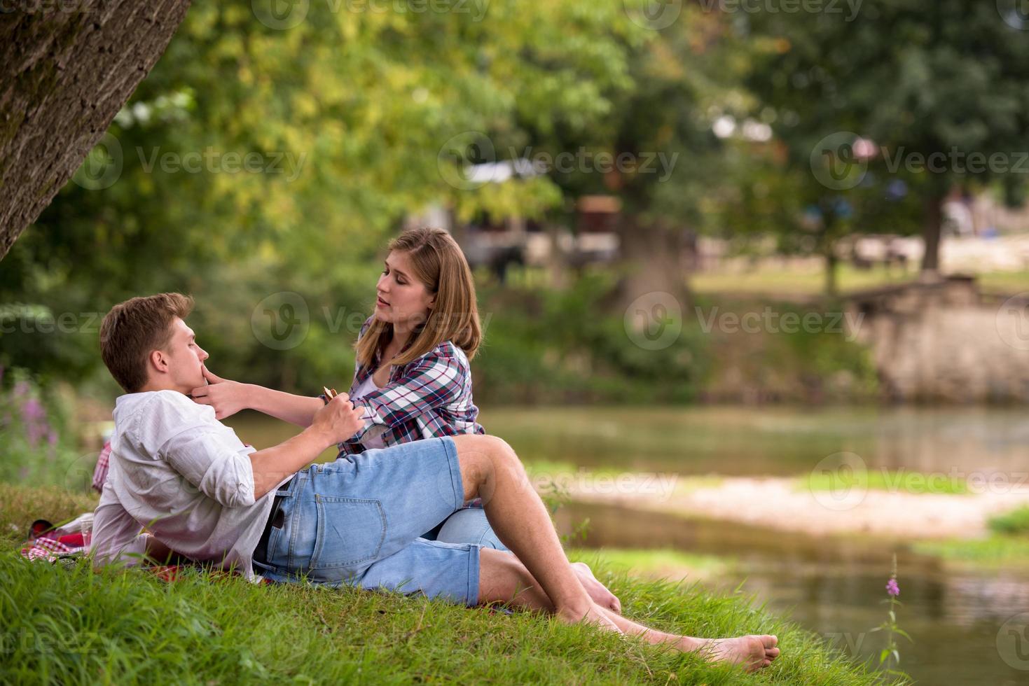 Couple in love enjoying picnic time photo