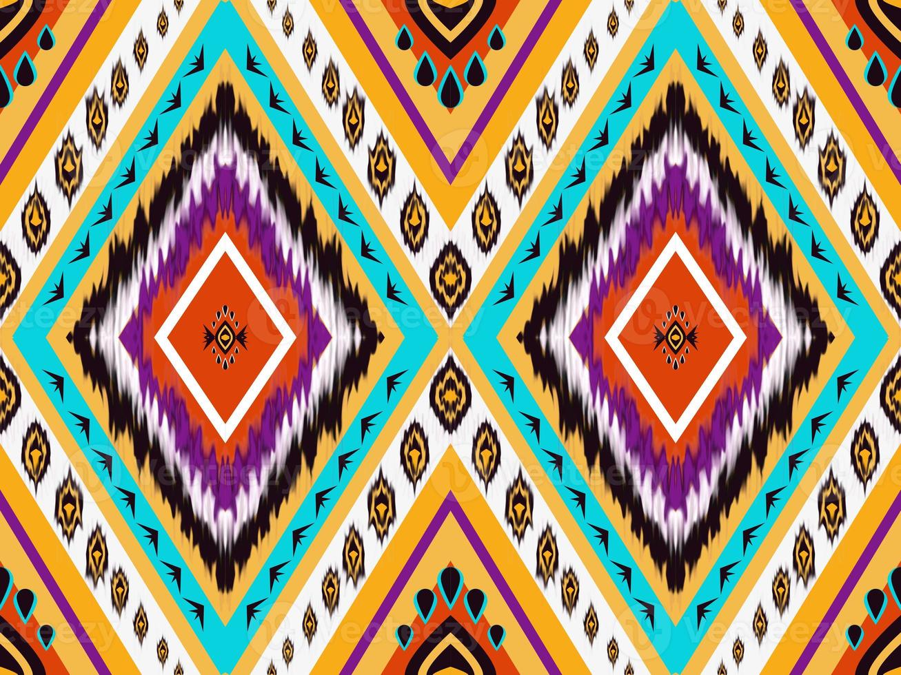 Ikat geometric folklore ornament. Tribal ethnic vector texture. Seamless striped pattern in Aztec style. Figure tribal embroidery. Indian, Scandinavian, Gyp sy, Mexican, folk pattern.ikat pattern photo