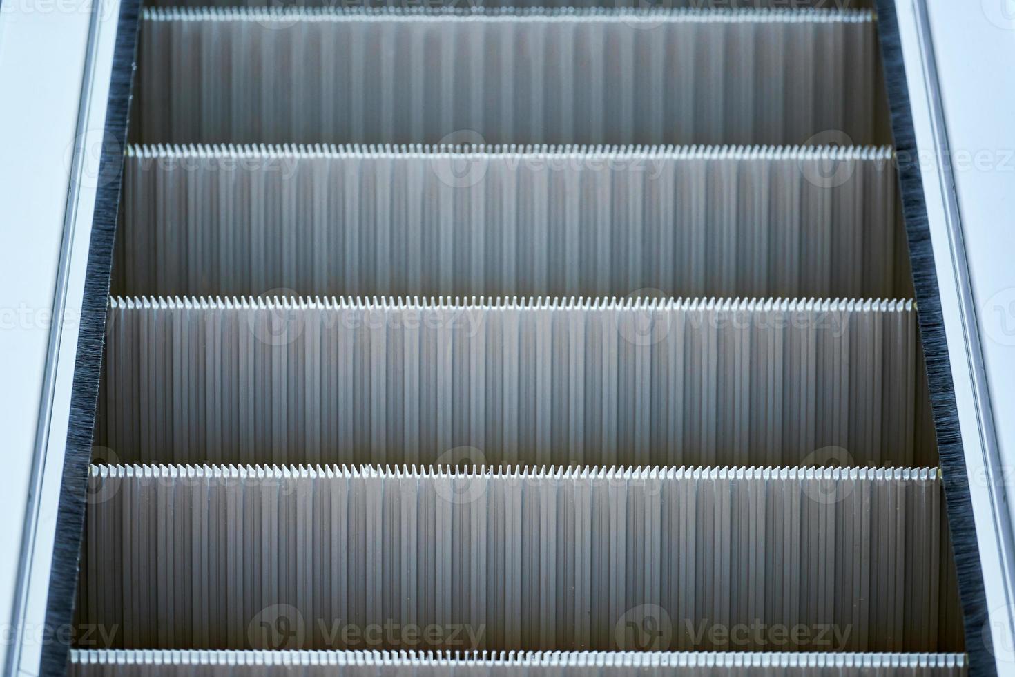 Escalator in shopping center photo