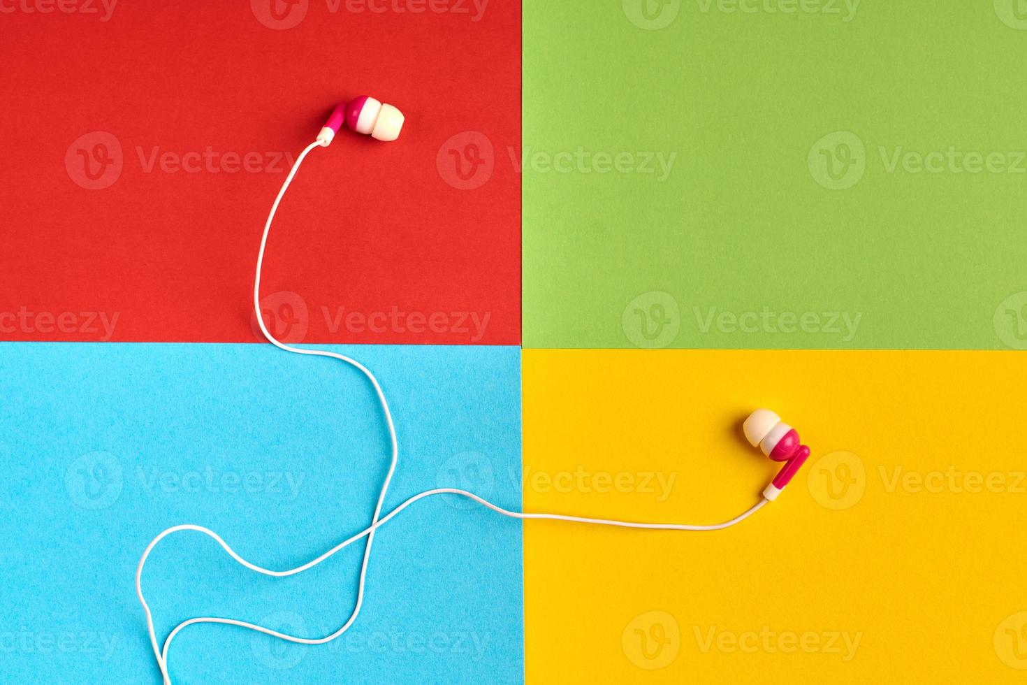 Red, green, blue, yellow paper colours. Audio software concept photo