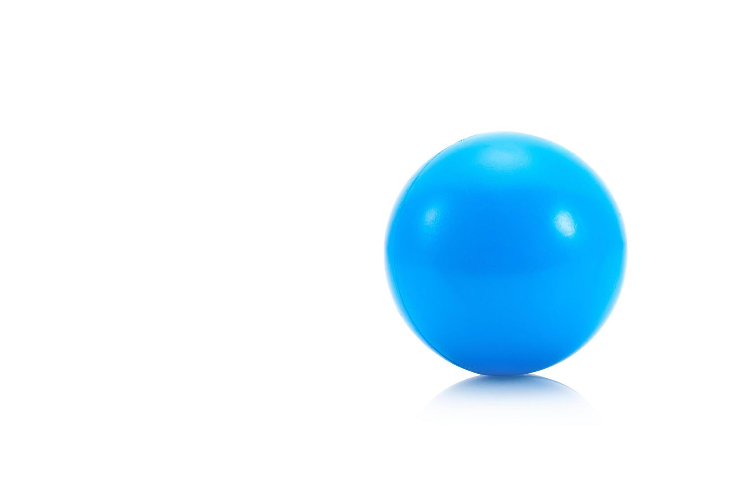 Blue stress ball on white background photo