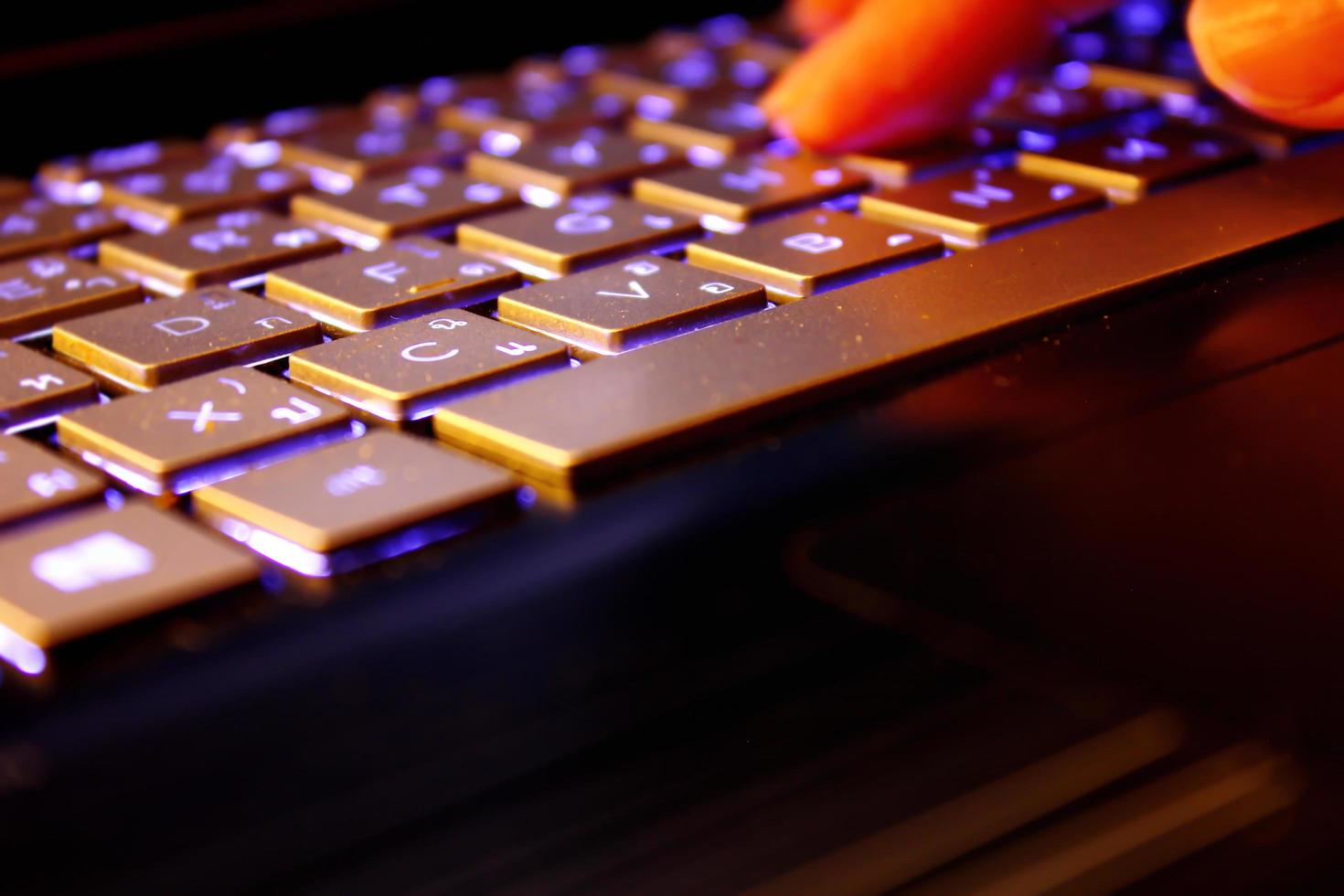 man using laptop, searching web, browsing information, having workplace at home, soft focus picture, Vintage concept, night photo