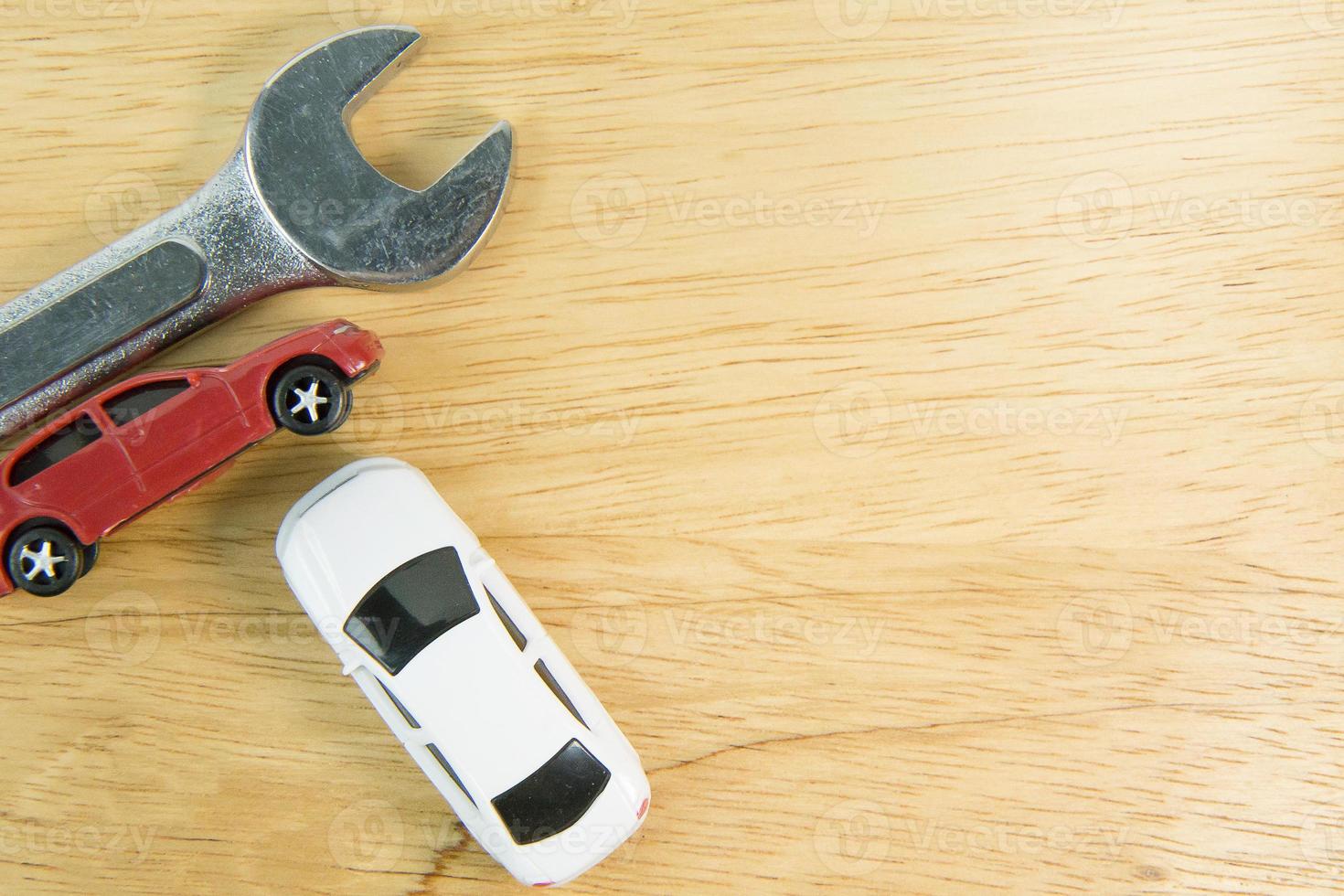 white car toy on wood table  image close up. photo