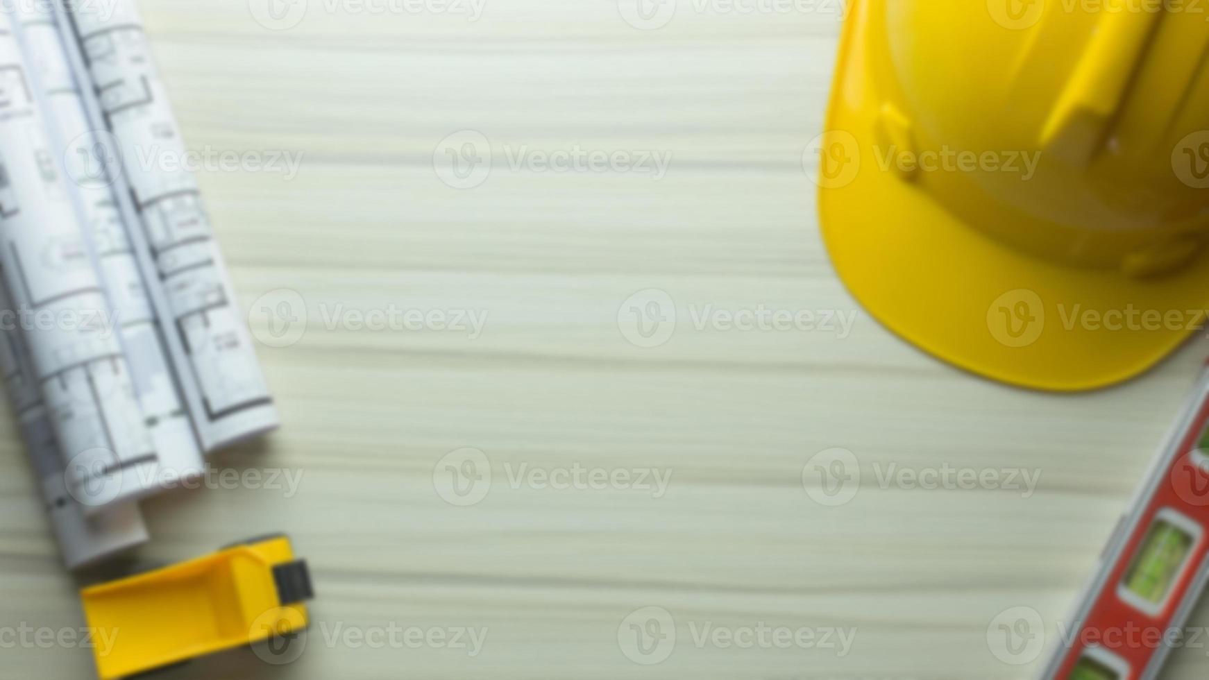 wood table and construction plan photo