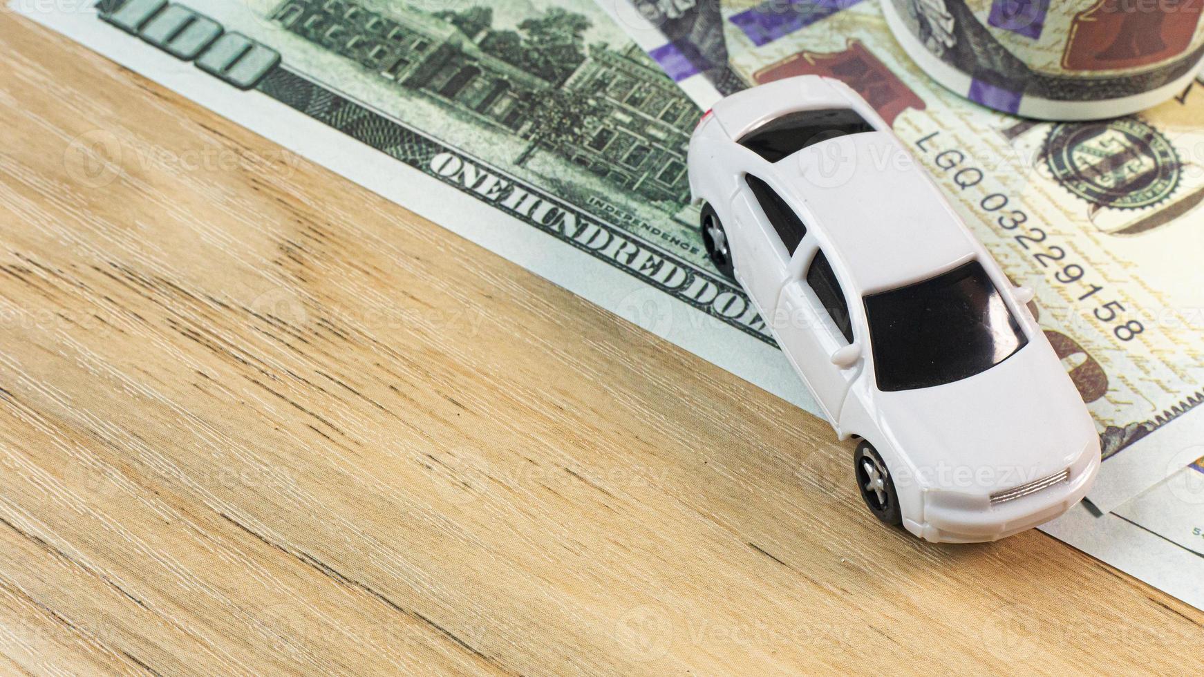 white  toy car  on work station table in office. photo