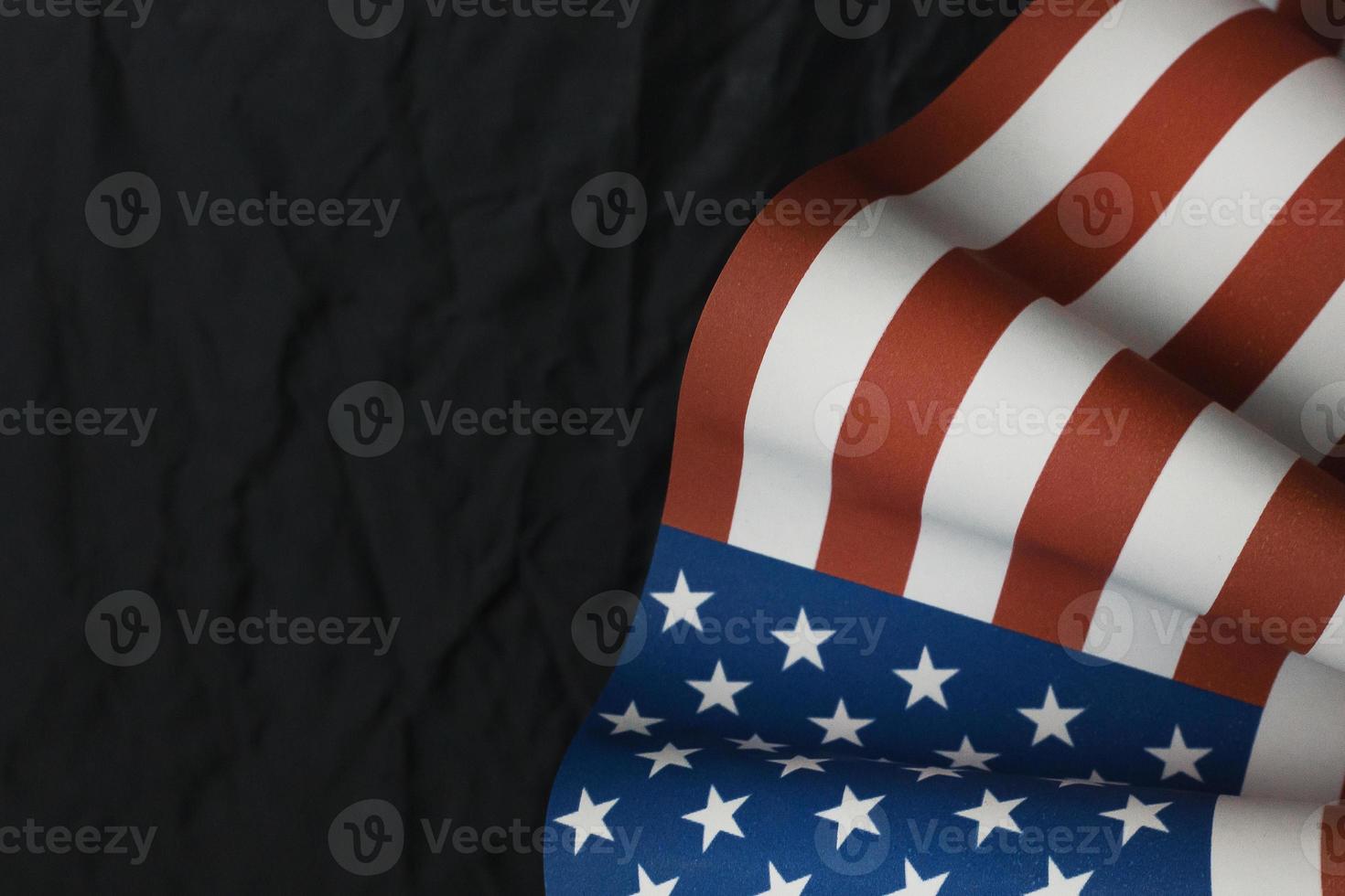 The Veterans Day  concept united states of America flag on black background. photo