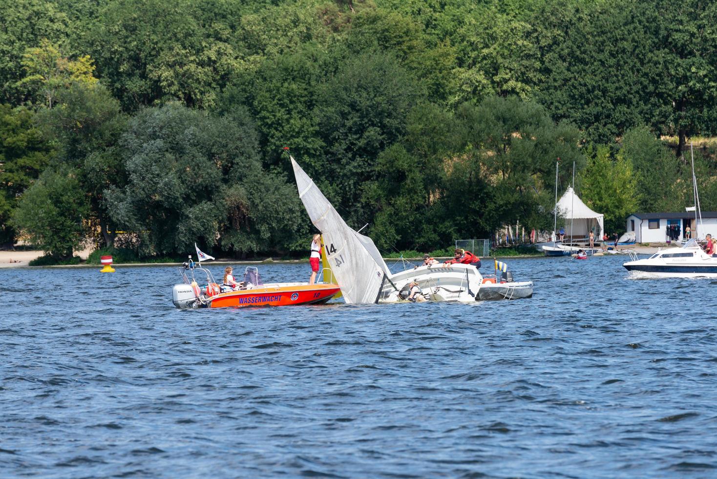 Berlin, Berlin Germany 07.23.2018 capsized sailboat photo
