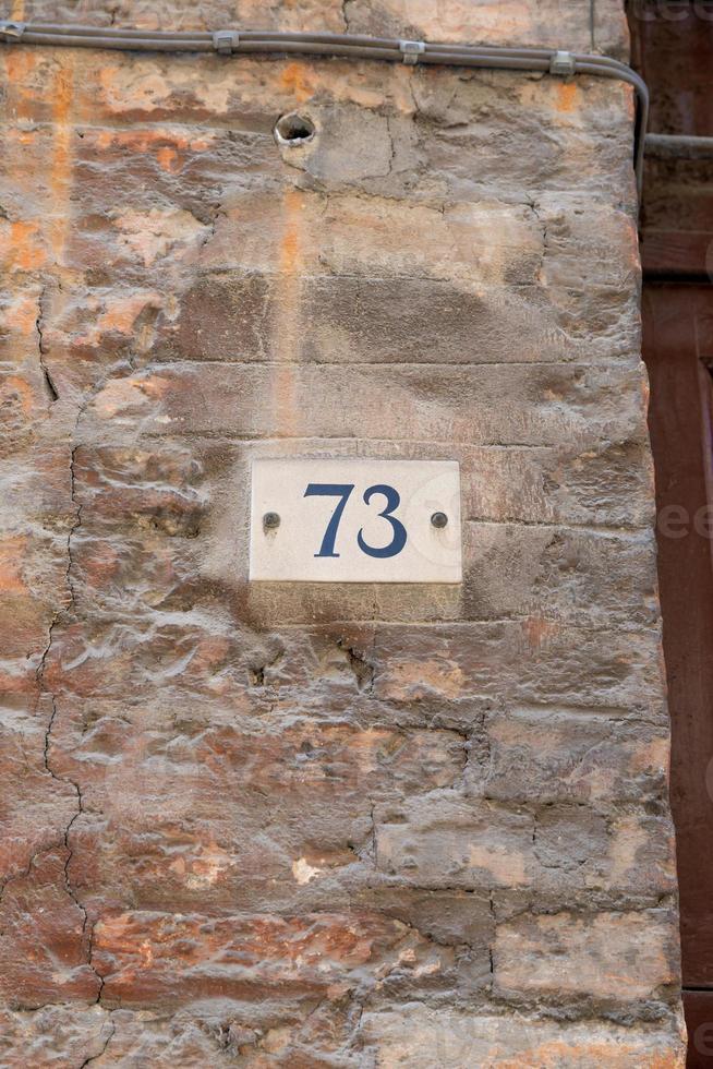 The house number on a wall photo