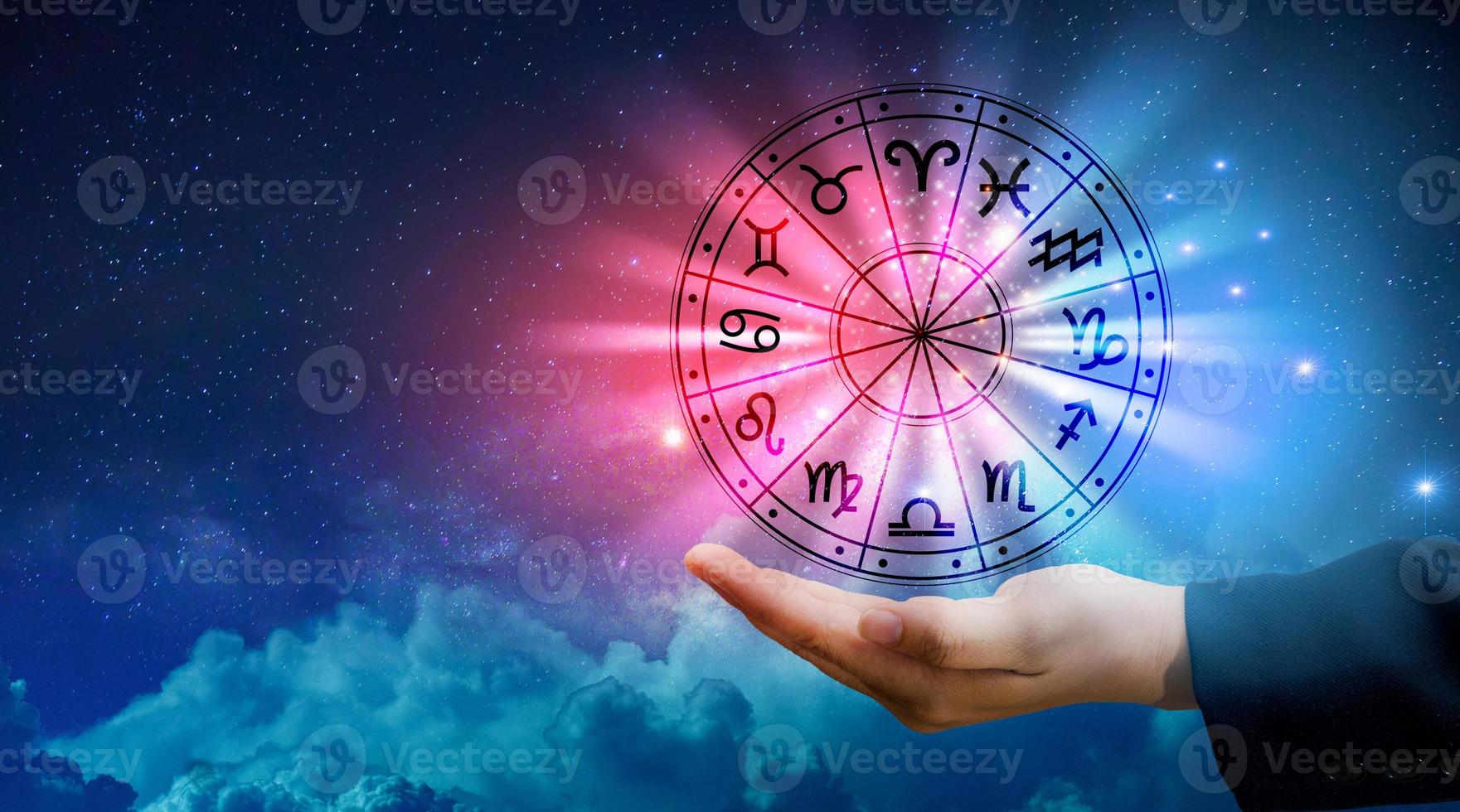 Zodiac signs inside of horoscope circle. Astrology in the sky with many stars and moons  astrology and horoscopes concept photo