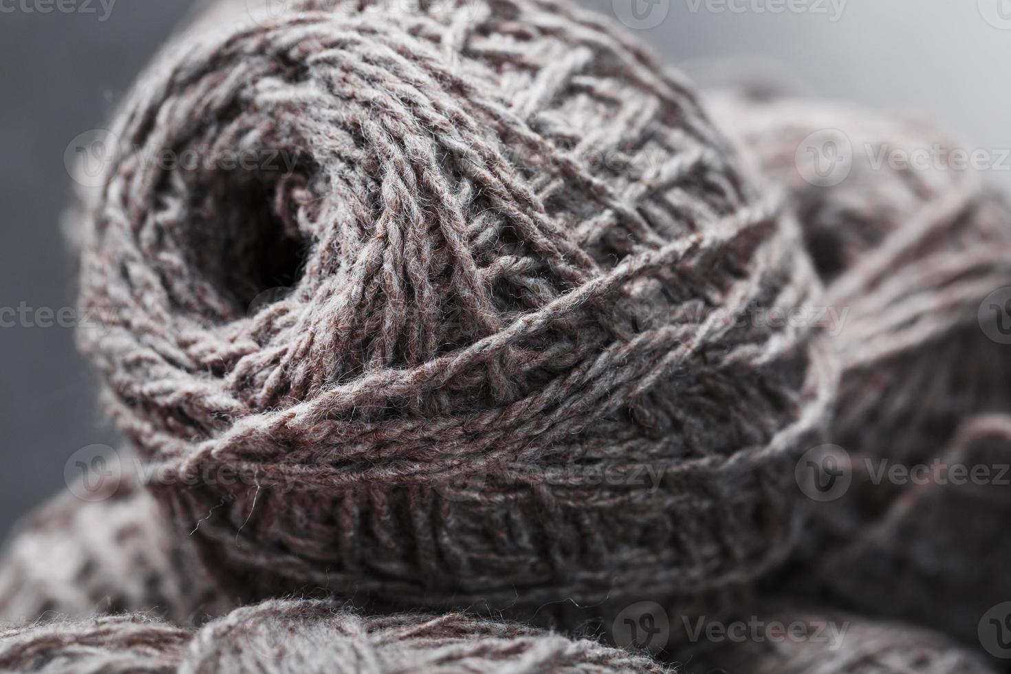 Light brown wool yarn made of threads in tangles. photo