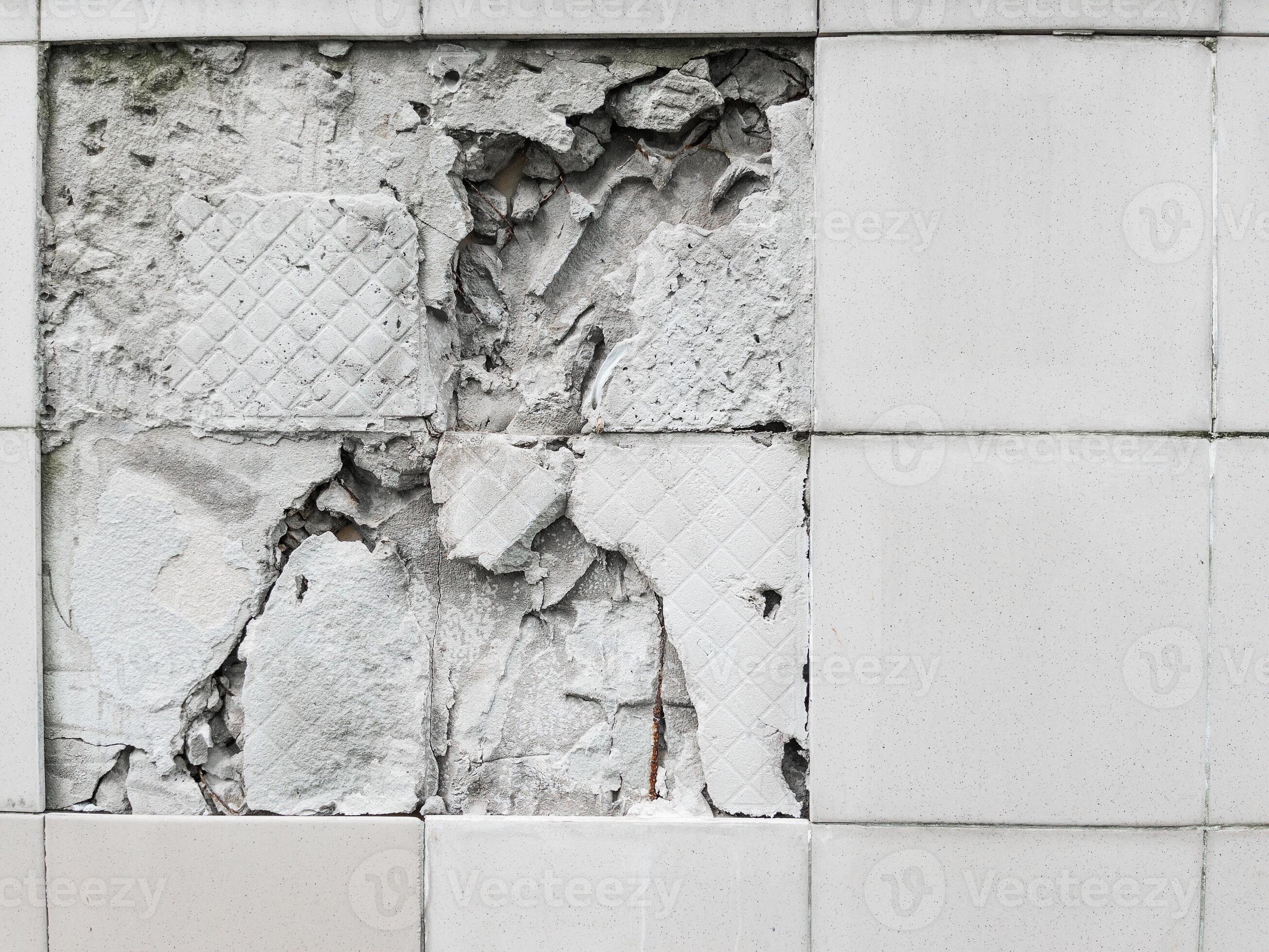 A Wall With A Broken Off Gray Tile From The Wall 10711913 Stock Photo download-feeling-broken-and-alone-wallpapers