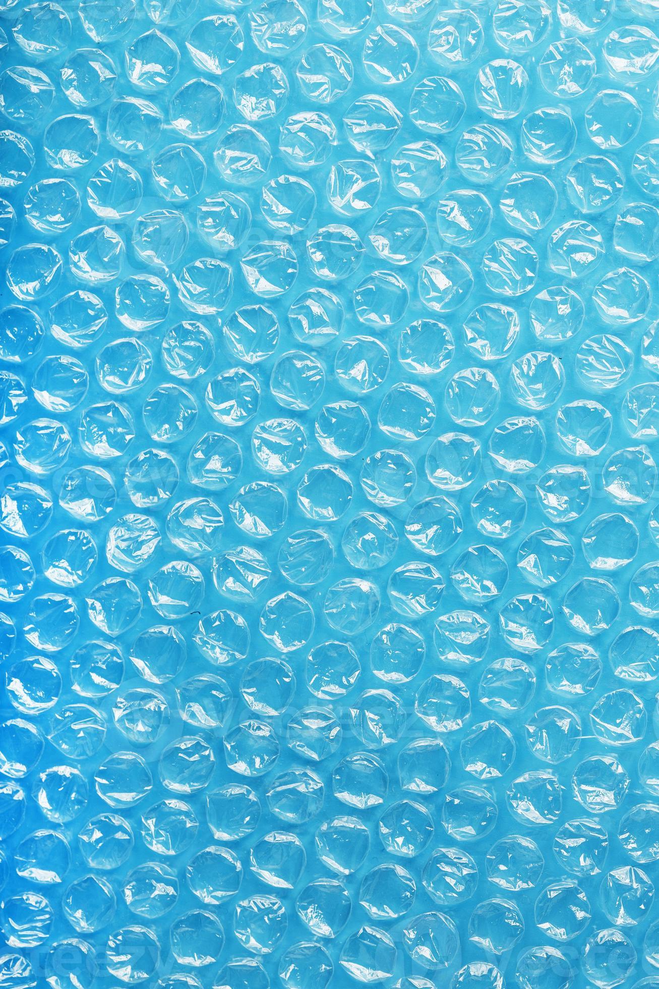 Packing bubble wrap for parcels on a blue background in full screen  10711967 Stock Photo at Vecteezy