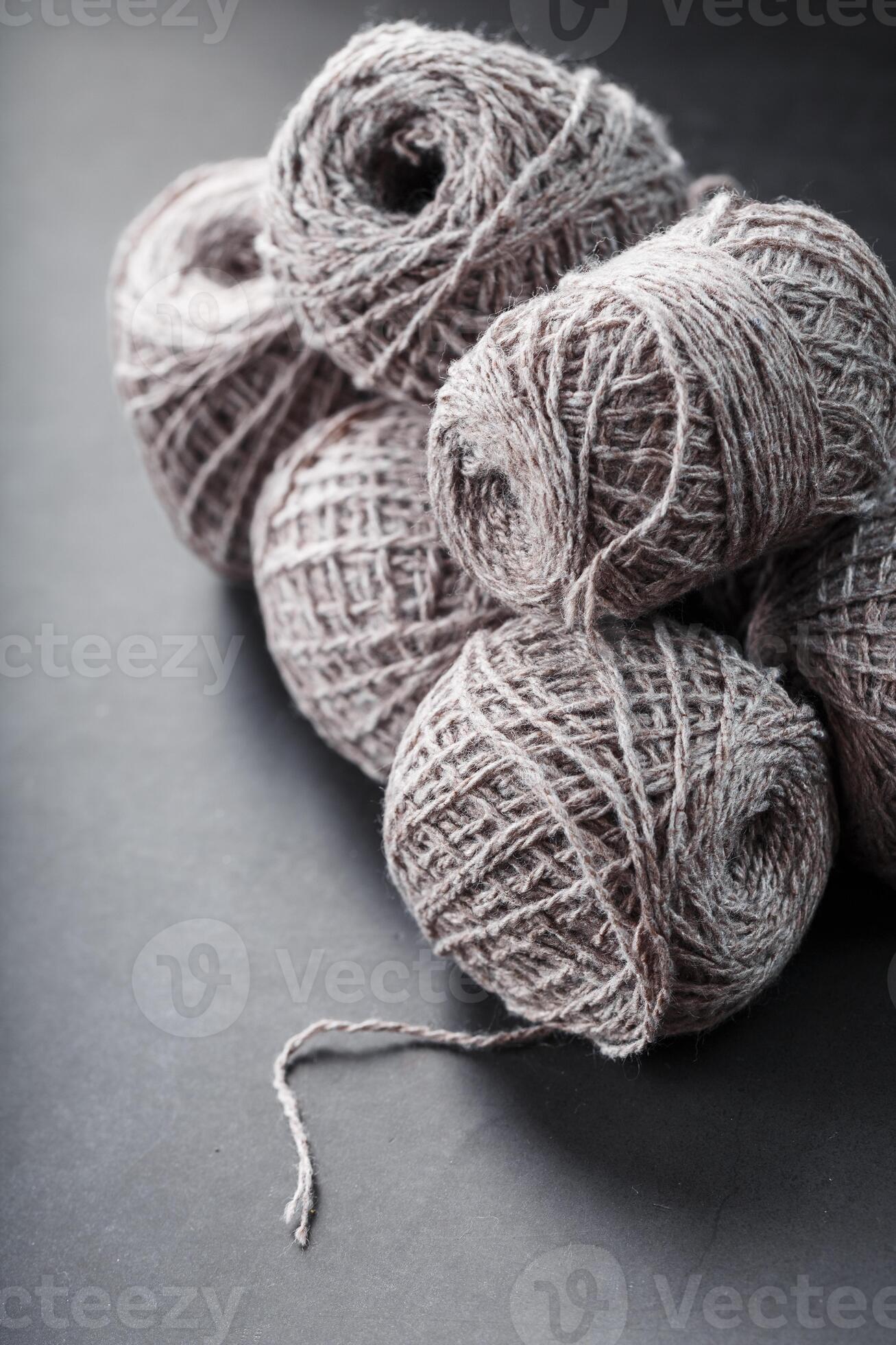 Balls of brown wool yarn made of natural wool. 10711976 Stock Photo at