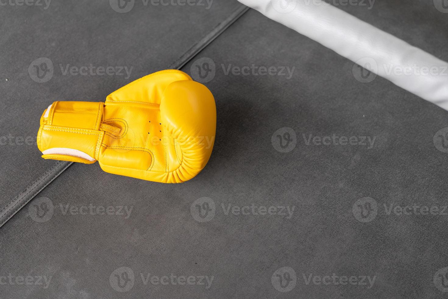 yellow boxing gloves in Gym Fitness. photo