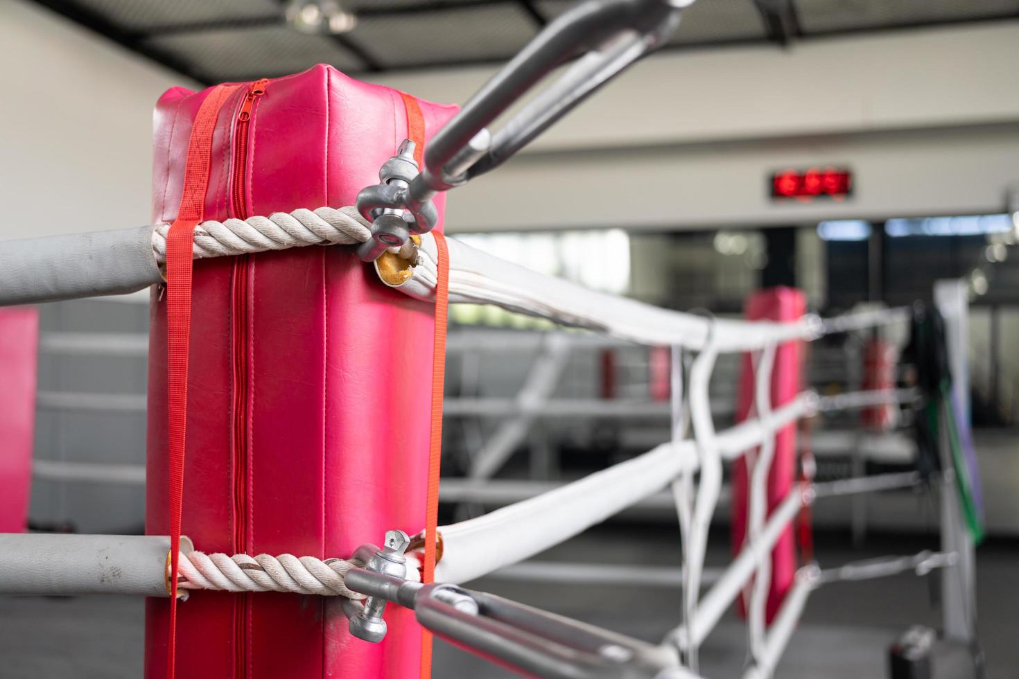 Boxing ring in the corner. Empty ring geared-up for fight boxers photo