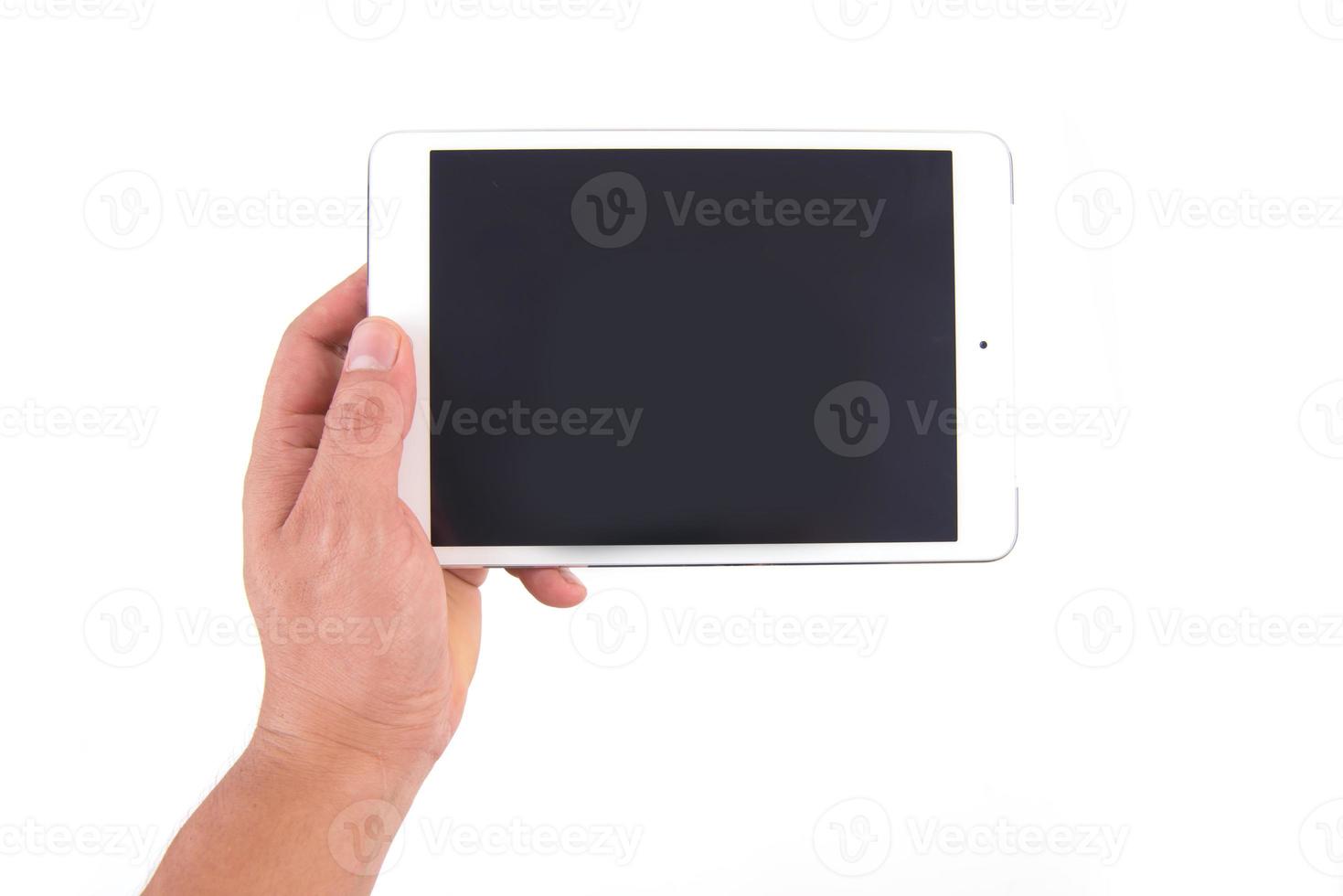 hand hold white tablet photo