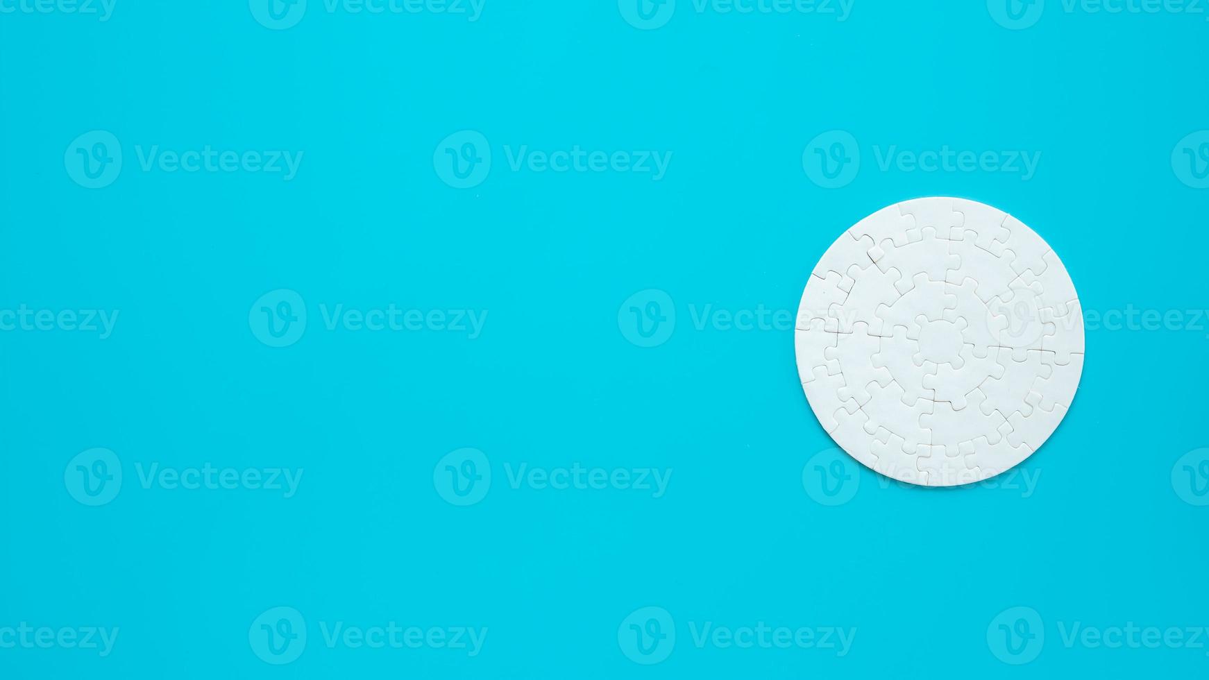 White part of jigsaw puzzle pieces on blue background. concepts of problem solving, business success, teamwork, Team playing jigsaw game incomplete, Texture photo with copy space for text
