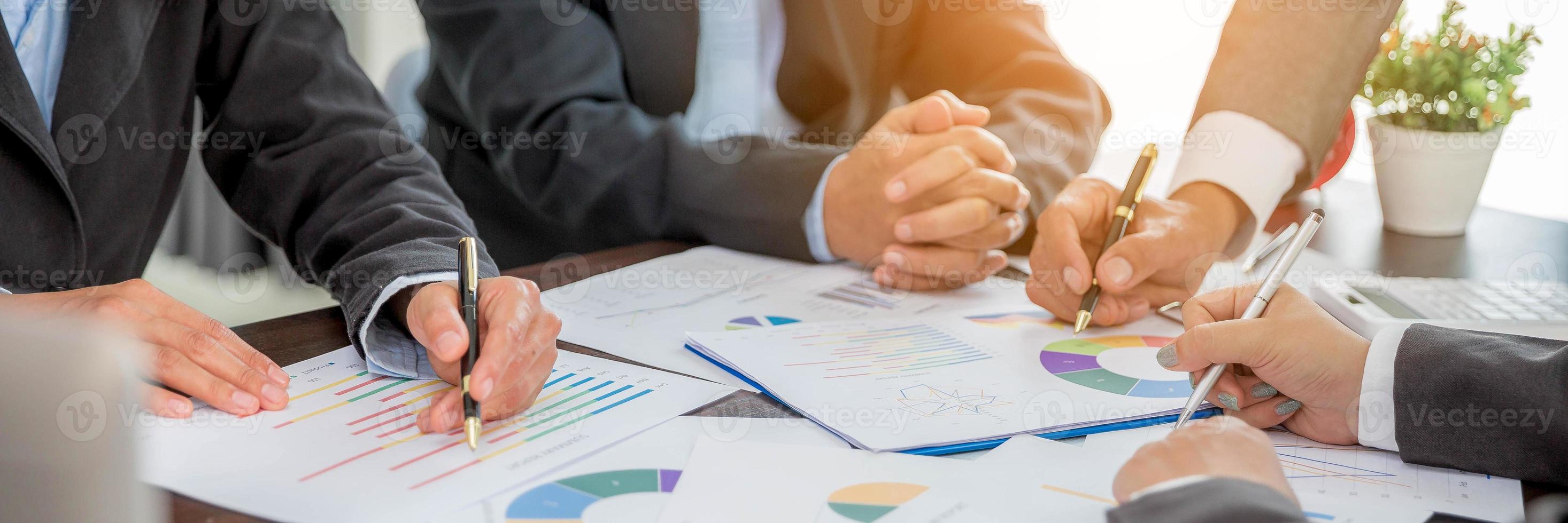 Banner of Group professional business people person working together analyze in office, work together to discuss company financial statistics report, brainstorm ideas graph datum documents on table. photo