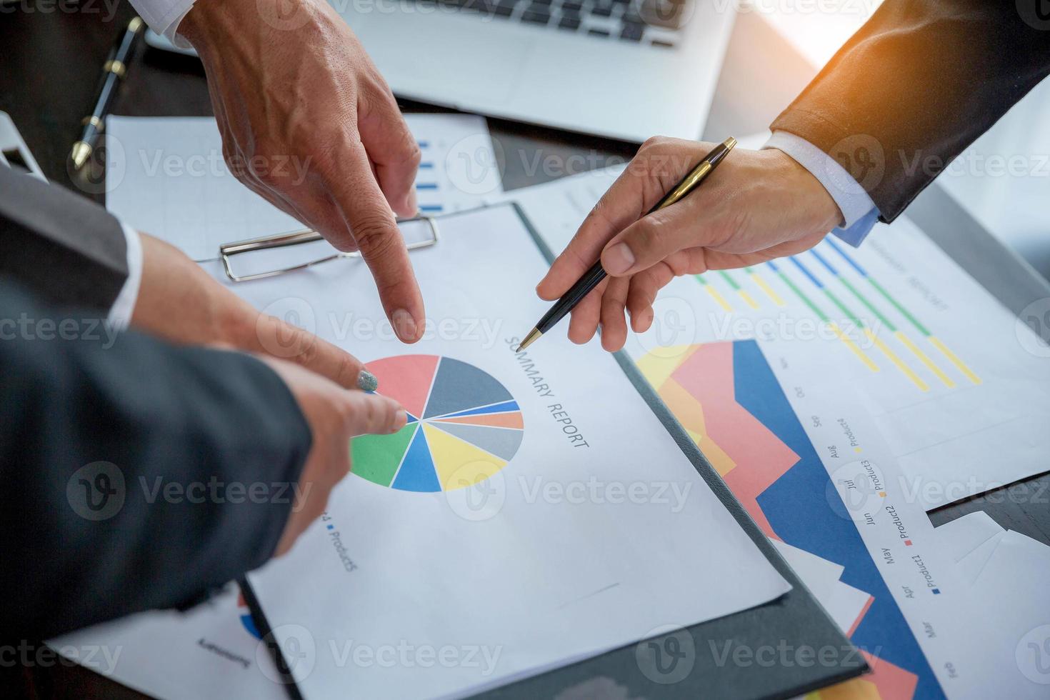 Group professional business people person working together to analyze in office, work together to discuss company financial statistics report, brainstorm ideas, and graph datum documents on the table. photo
