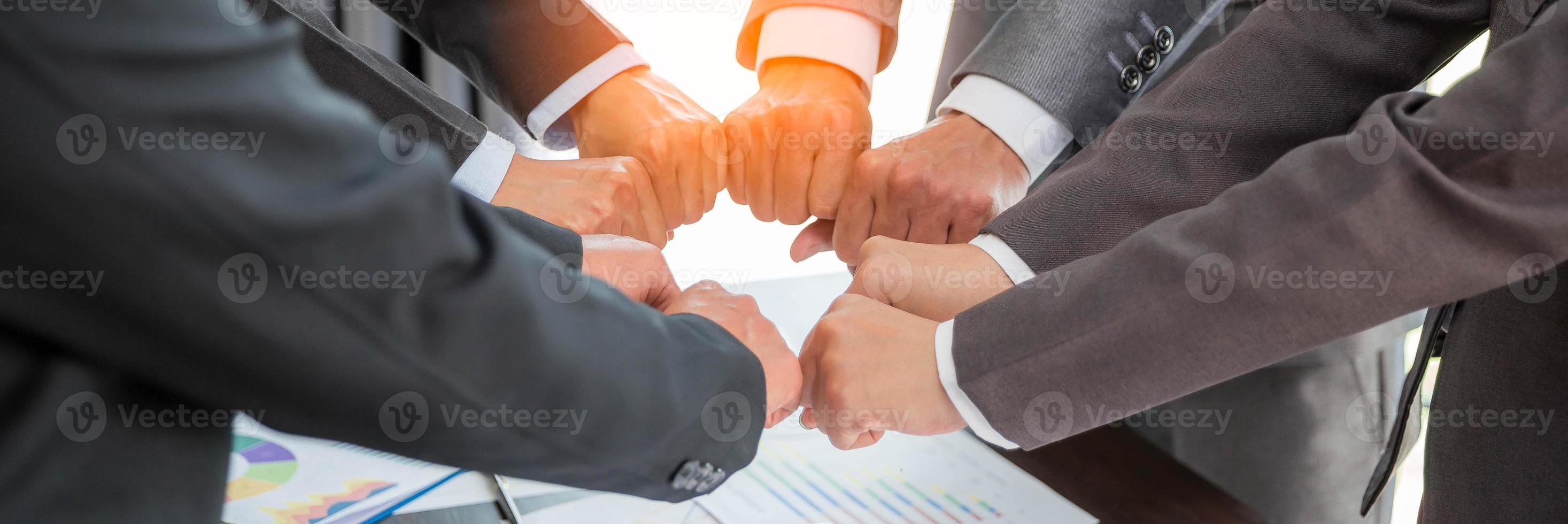 Banner of group hand success business people person working together in office. Diversity of businessman and businesswoman attending corporate meetings. concept of friendship, cooperation corporate. photo