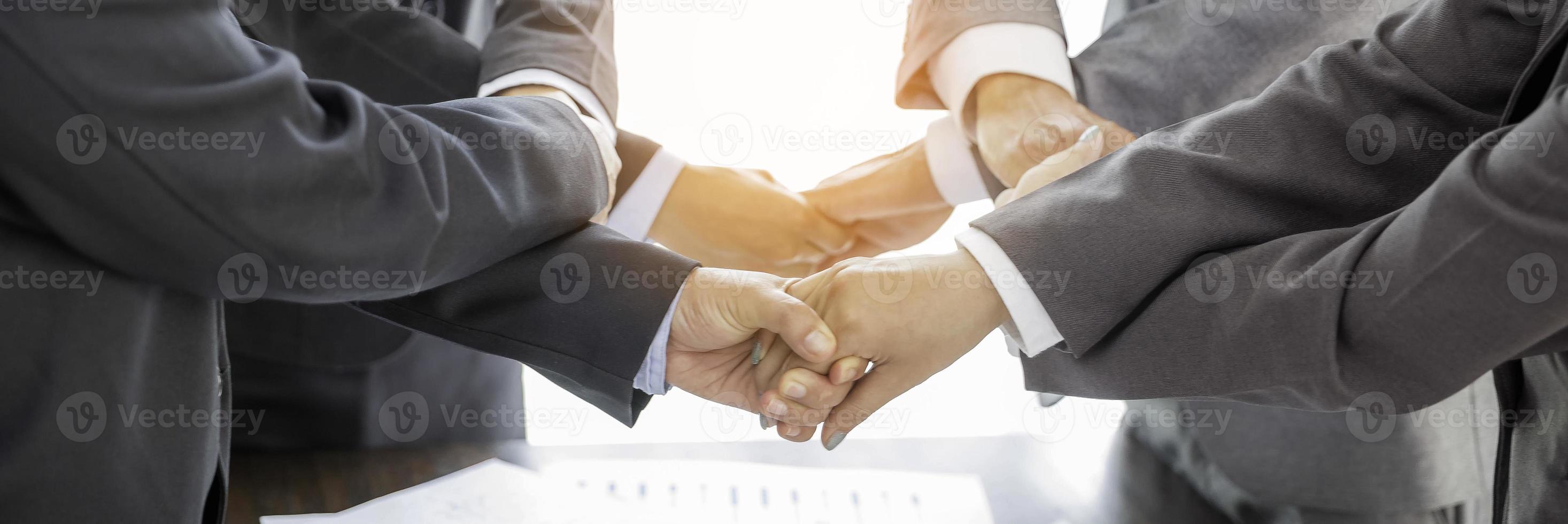 Banner of group hand success business people person working together in office. Diversity of businessman and businesswoman attending corporate meetings. concept of friendship, cooperation corporate. photo