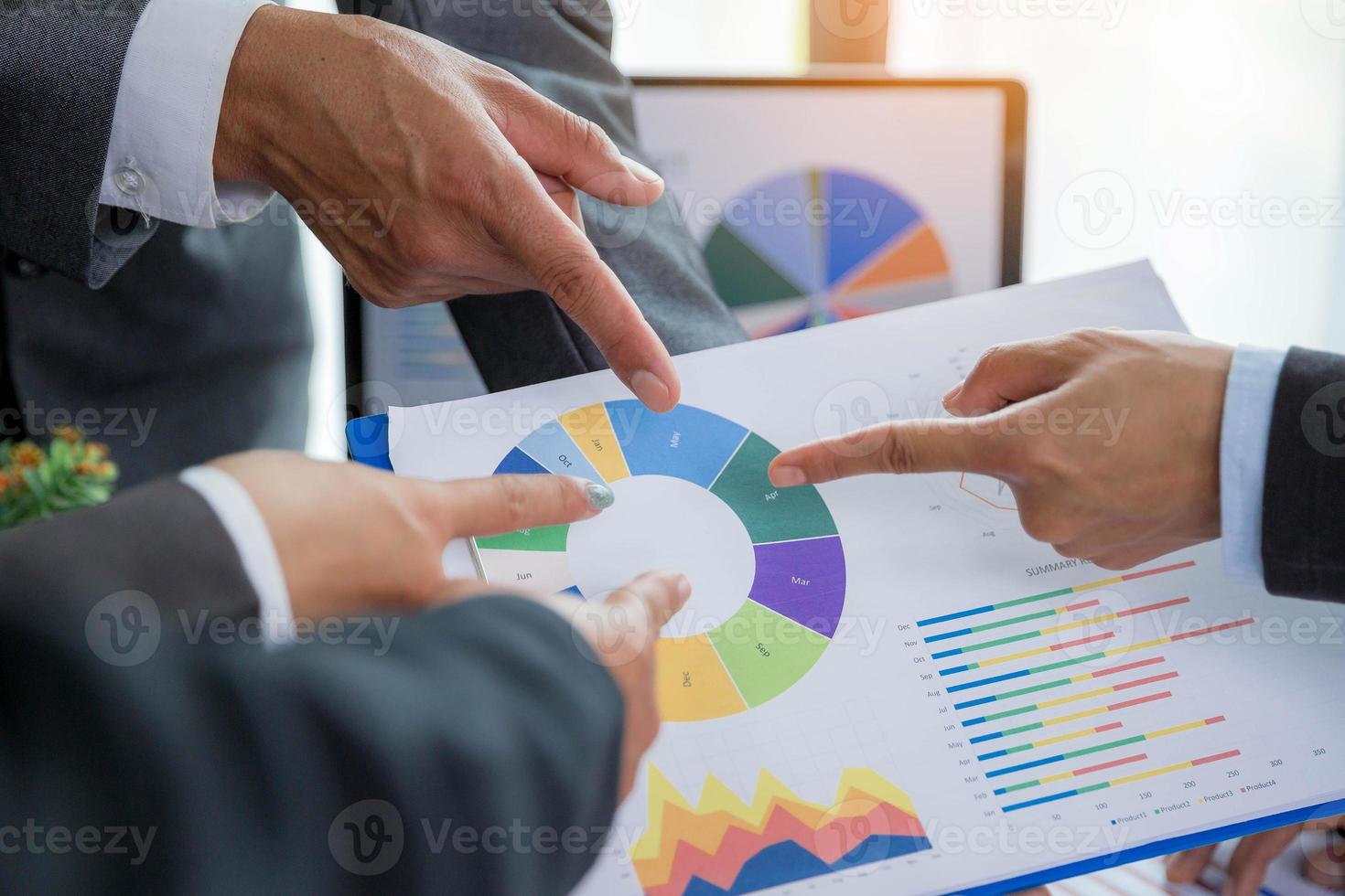 Group professional business people person working together to analyze in office, work together to discuss company financial statistics report, brainstorm ideas, and graph datum documents on the table. photo